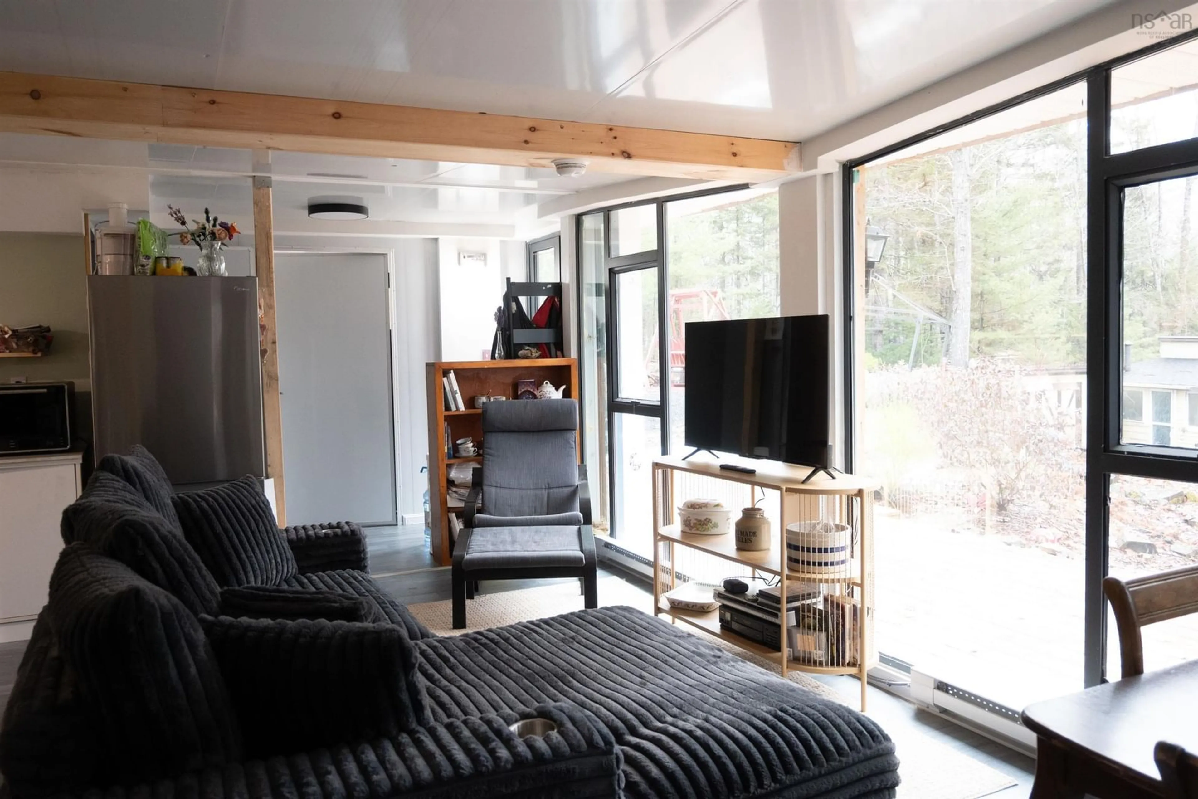 Living room with furniture, wood/laminate floor for 25 Hirtle Dr, Hemford Nova Scotia B0R 1E0