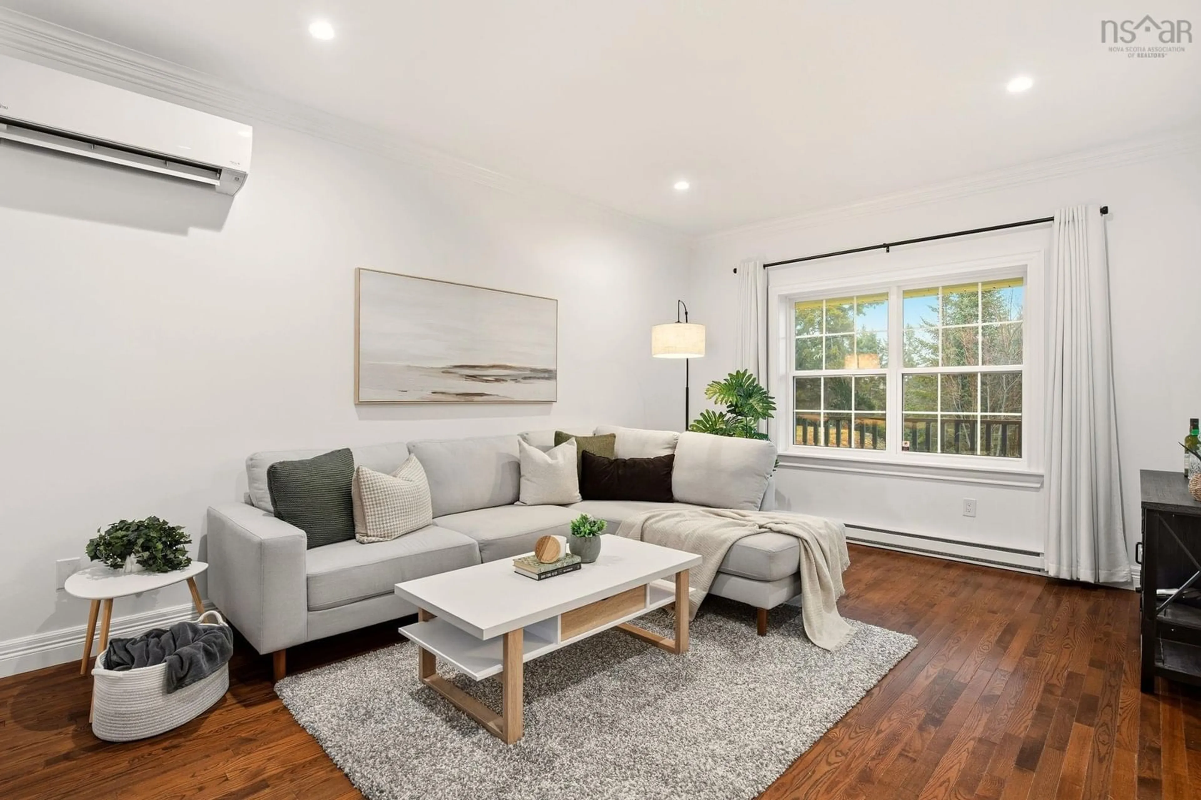 Living room with furniture, wood/laminate floor for 883 Mineville Rd, Mineville Nova Scotia B2Z 1K1