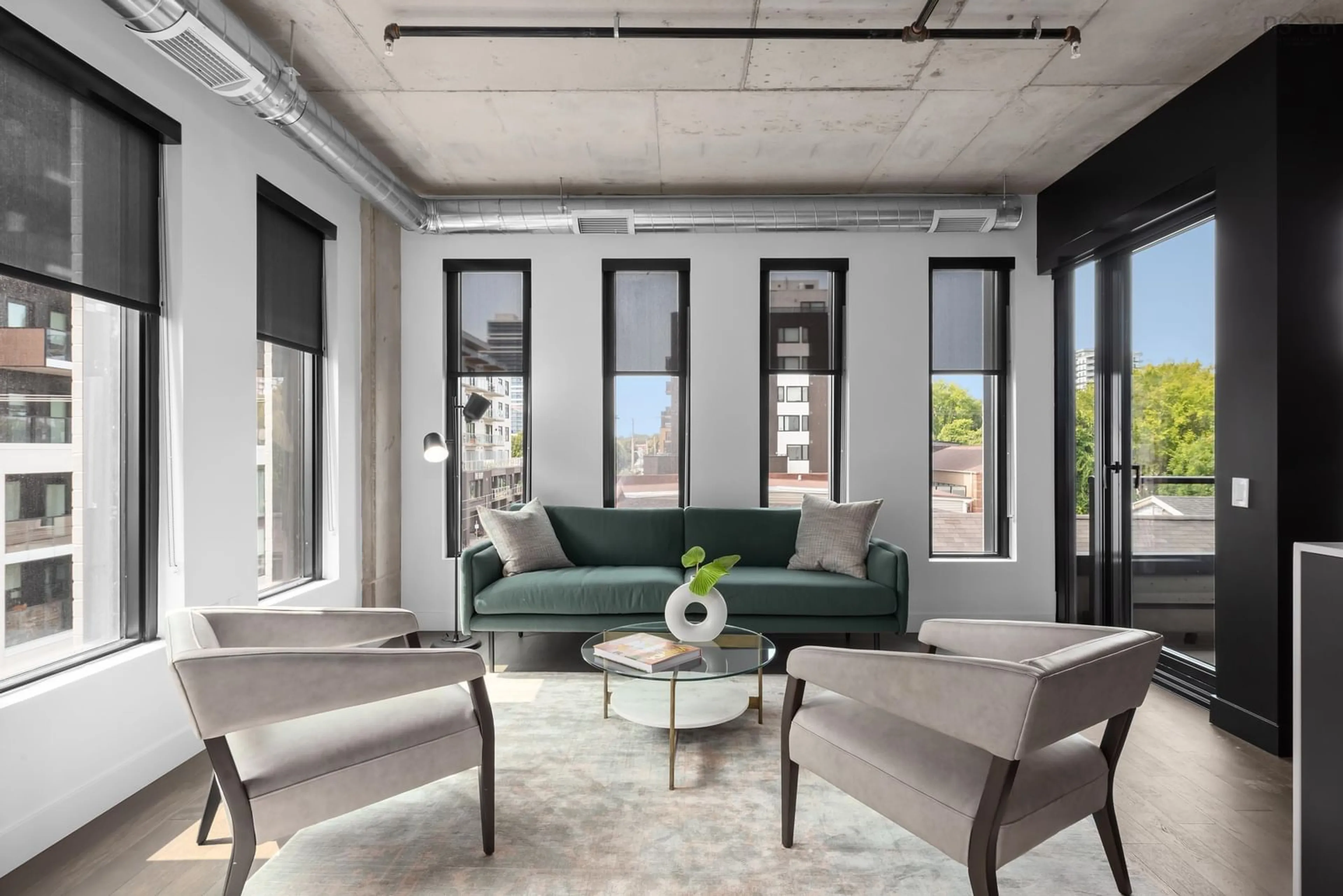 Living room with furniture, cement floor for 5511 Bilby St St #404, Halifax Nova Scotia B3K 0M5