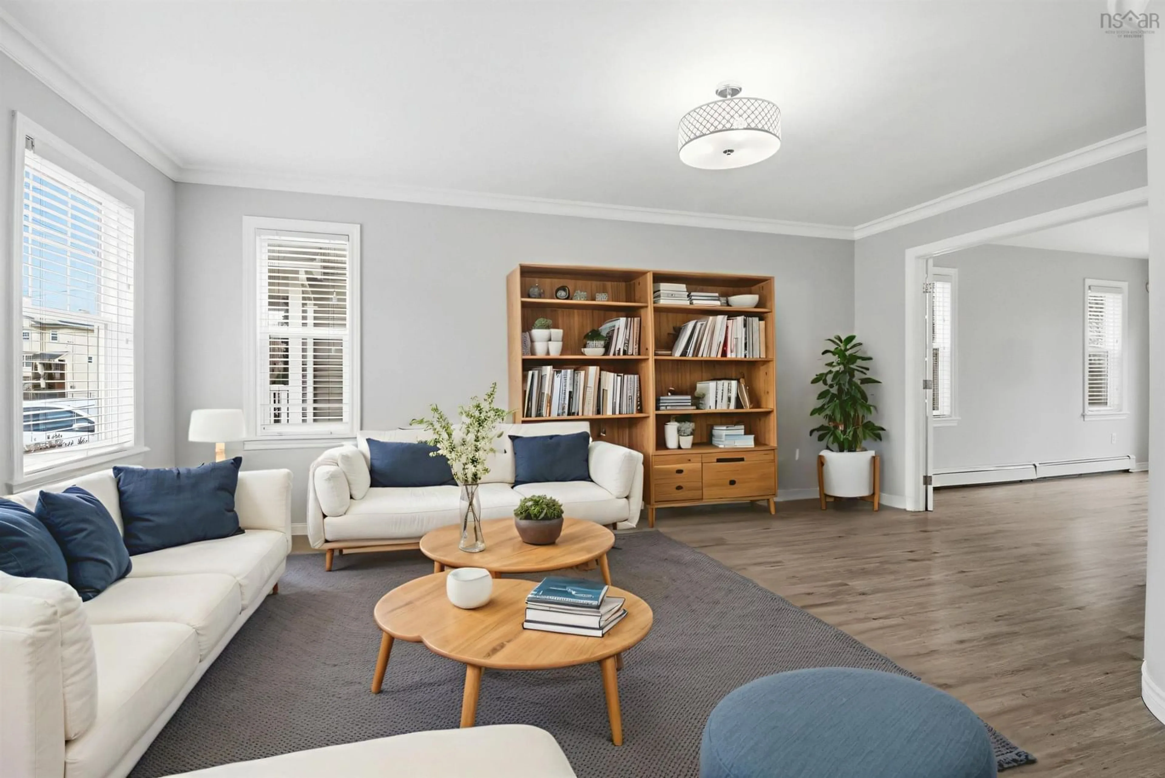 Living room with furniture, wood/laminate floor for 227 Sheppards Run, Beachville Nova Scotia B3T 2G2