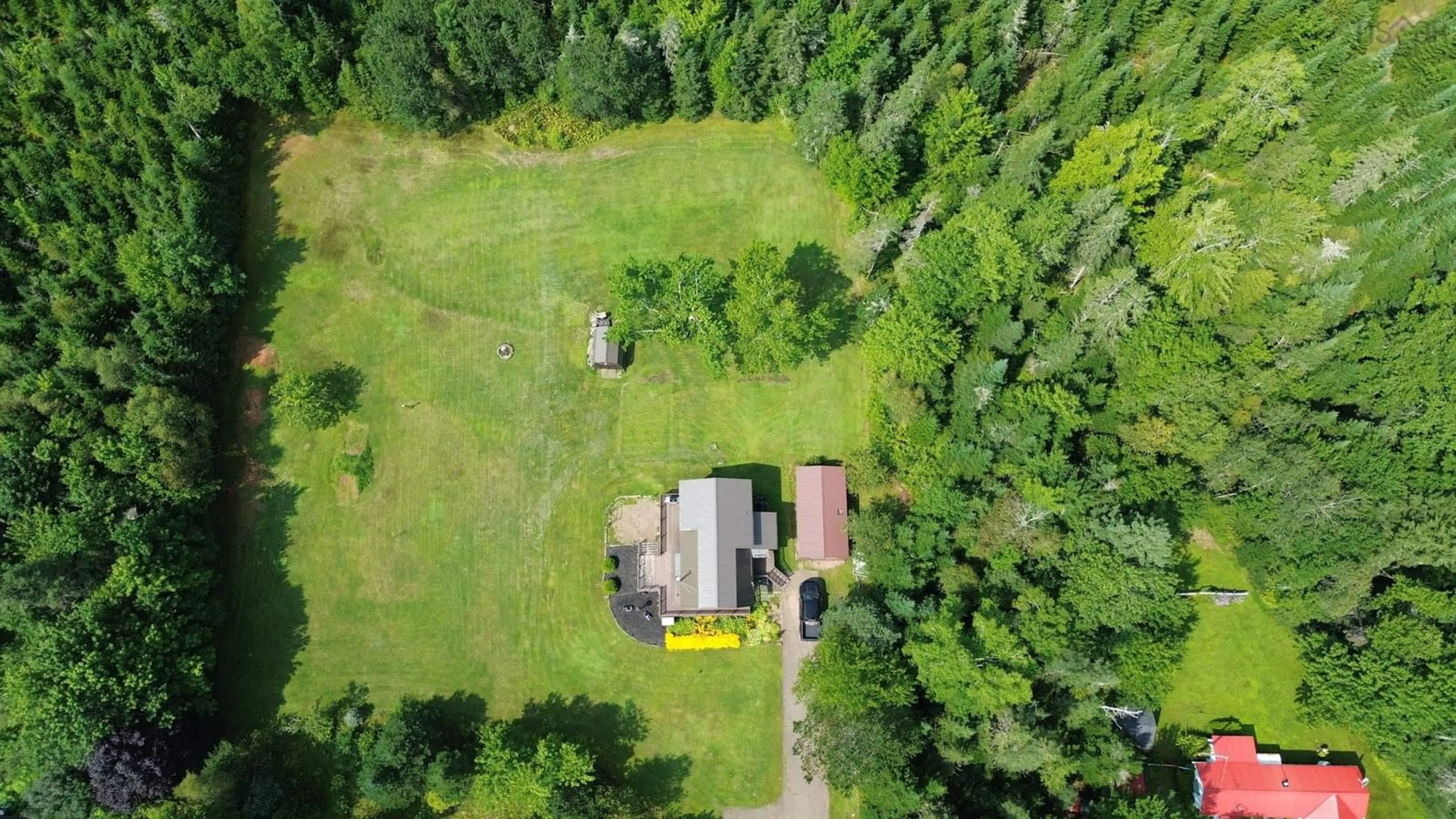 A pic from outside/outdoor area/front of a property/back of a property/a pic from drone, forest/trees view for 907 Crowes Mills Rd, Crowes Mills Nova Scotia B0M 1C0