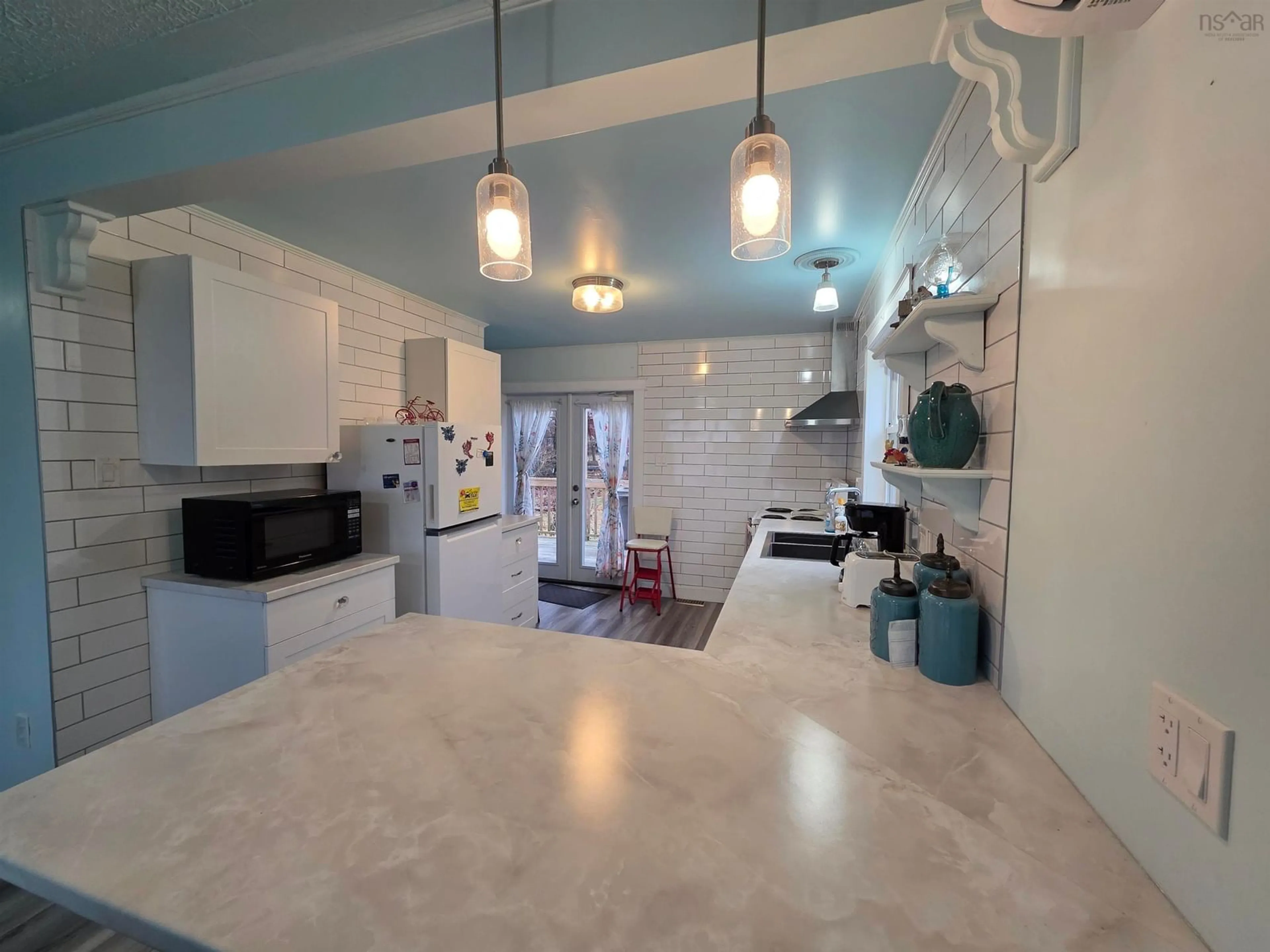 Open concept kitchen, ceramic/tile floor for 34 Young Ave, North Sydney Nova Scotia B2A 1Y6