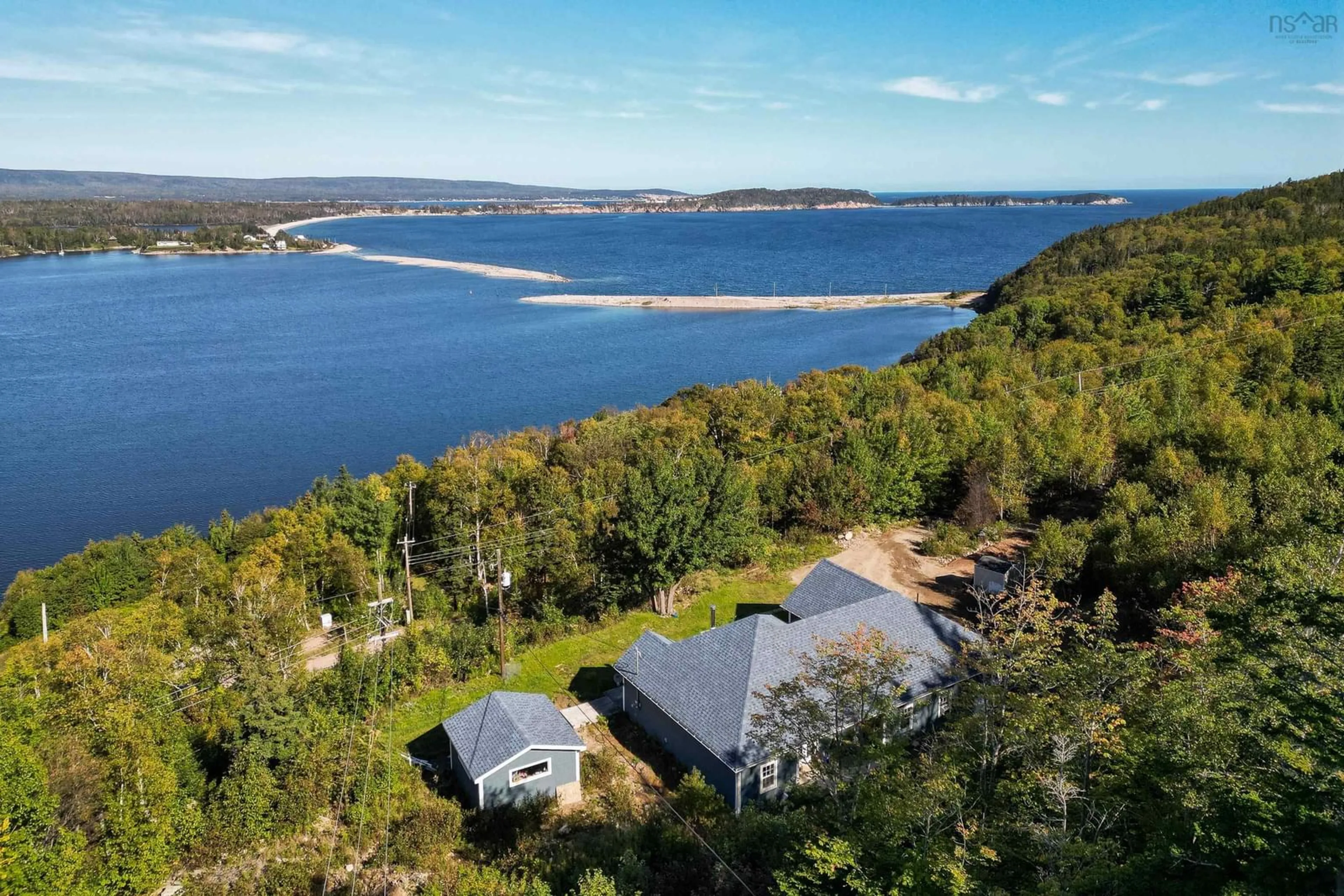 A pic from outside/outdoor area/front of a property/back of a property/a pic from drone, water/lake/river/ocean view for 39170 Cabot Trail Rd, Ingonish Nova Scotia B0C 1L0
