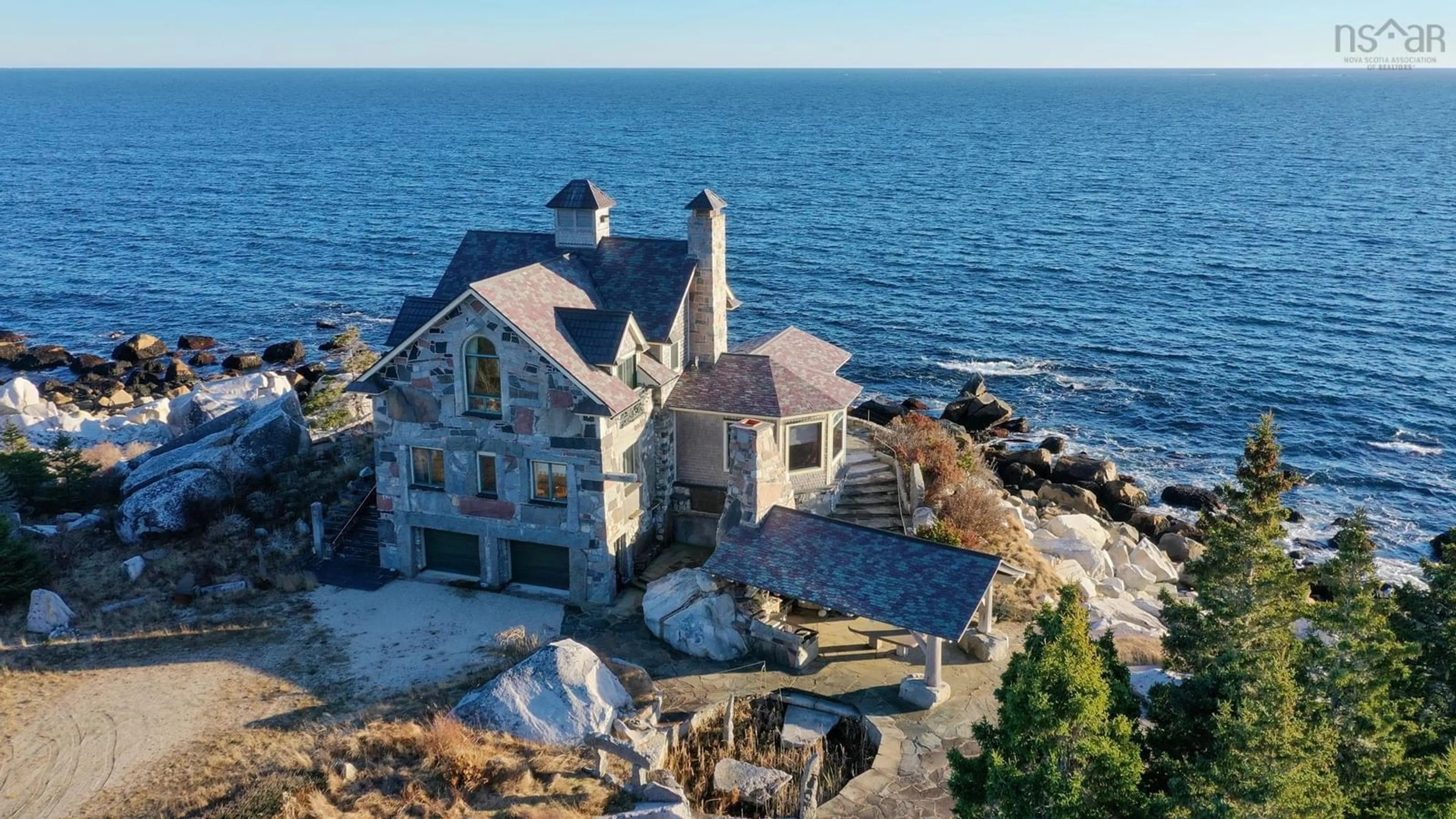 A pic from outside/outdoor area/front of a property/back of a property/a pic from drone, water/lake/river/ocean view for 120 Everetts Way, Hunts Point Nova Scotia B0T 1G0