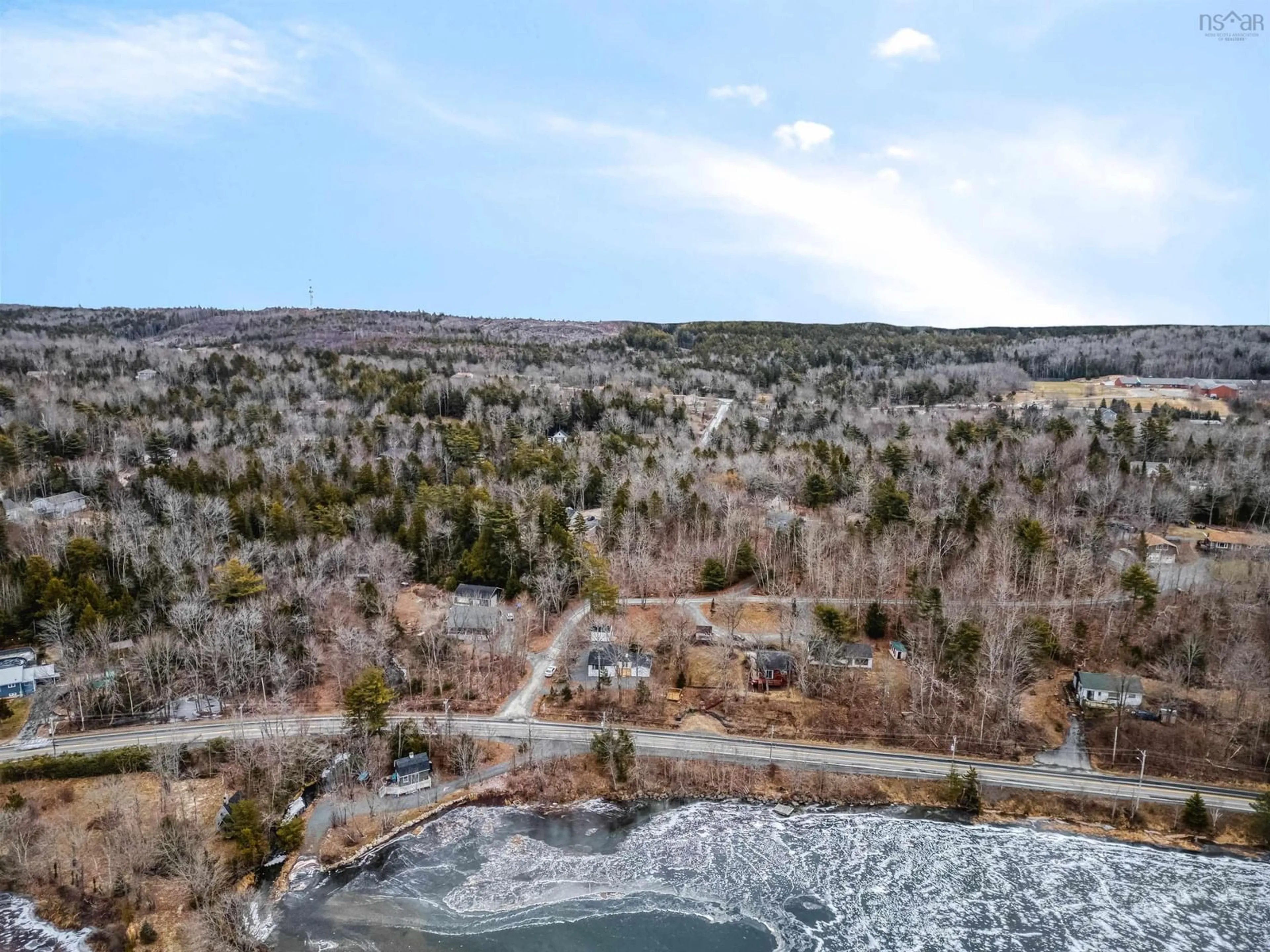 A pic from outside/outdoor area/front of a property/back of a property/a pic from drone, water/lake/river/ocean view for 4006 Highway 2, Fletchers Lake Nova Scotia B2T 1A3