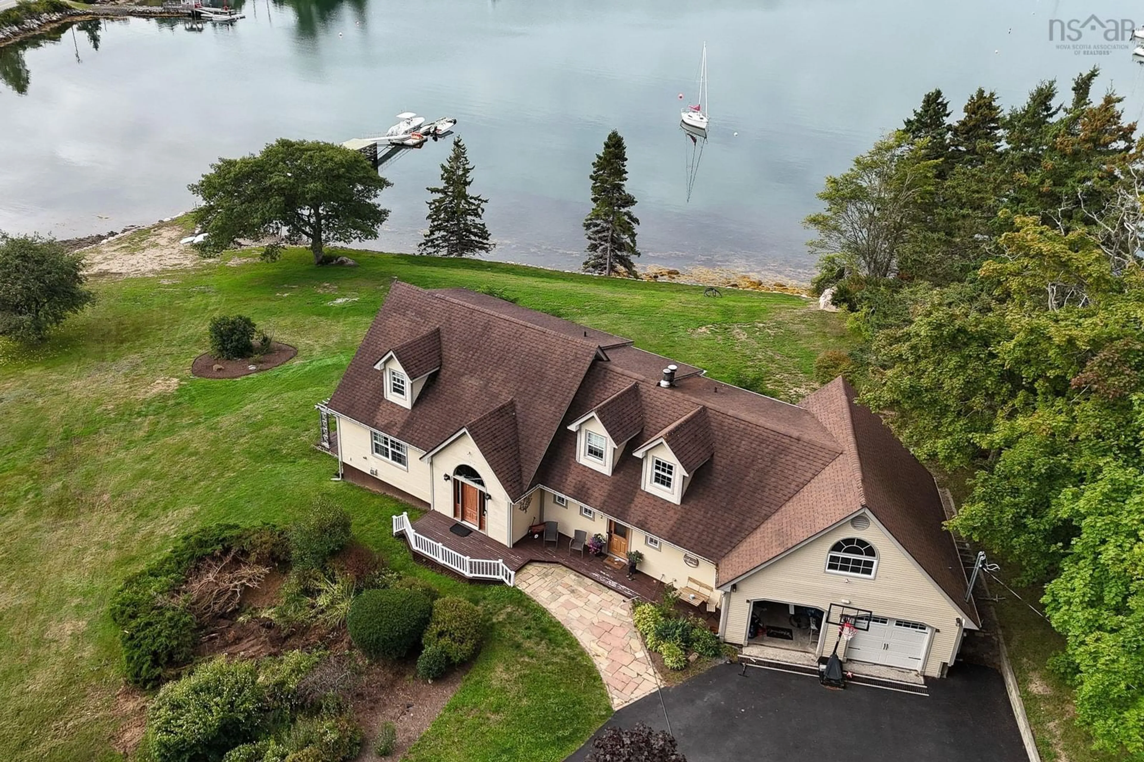 A pic from outside/outdoor area/front of a property/back of a property/a pic from drone, water/lake/river/ocean view for 2 Crouchers Point Rd, French Village Nova Scotia B3Z 2W4