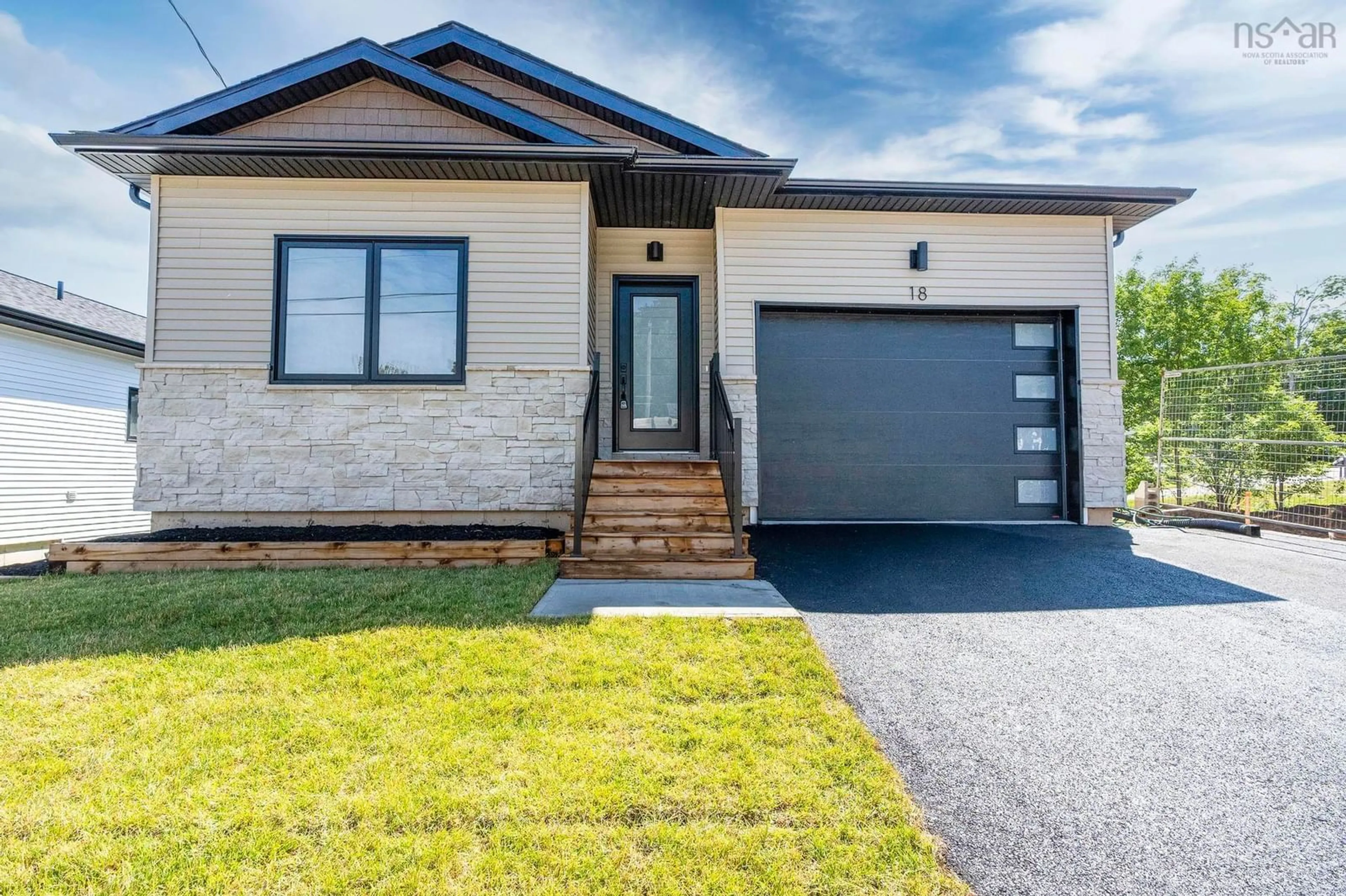 Home with brick exterior material, street for 18 Whidden Ave, Wolfville Nova Scotia B4P 0A8