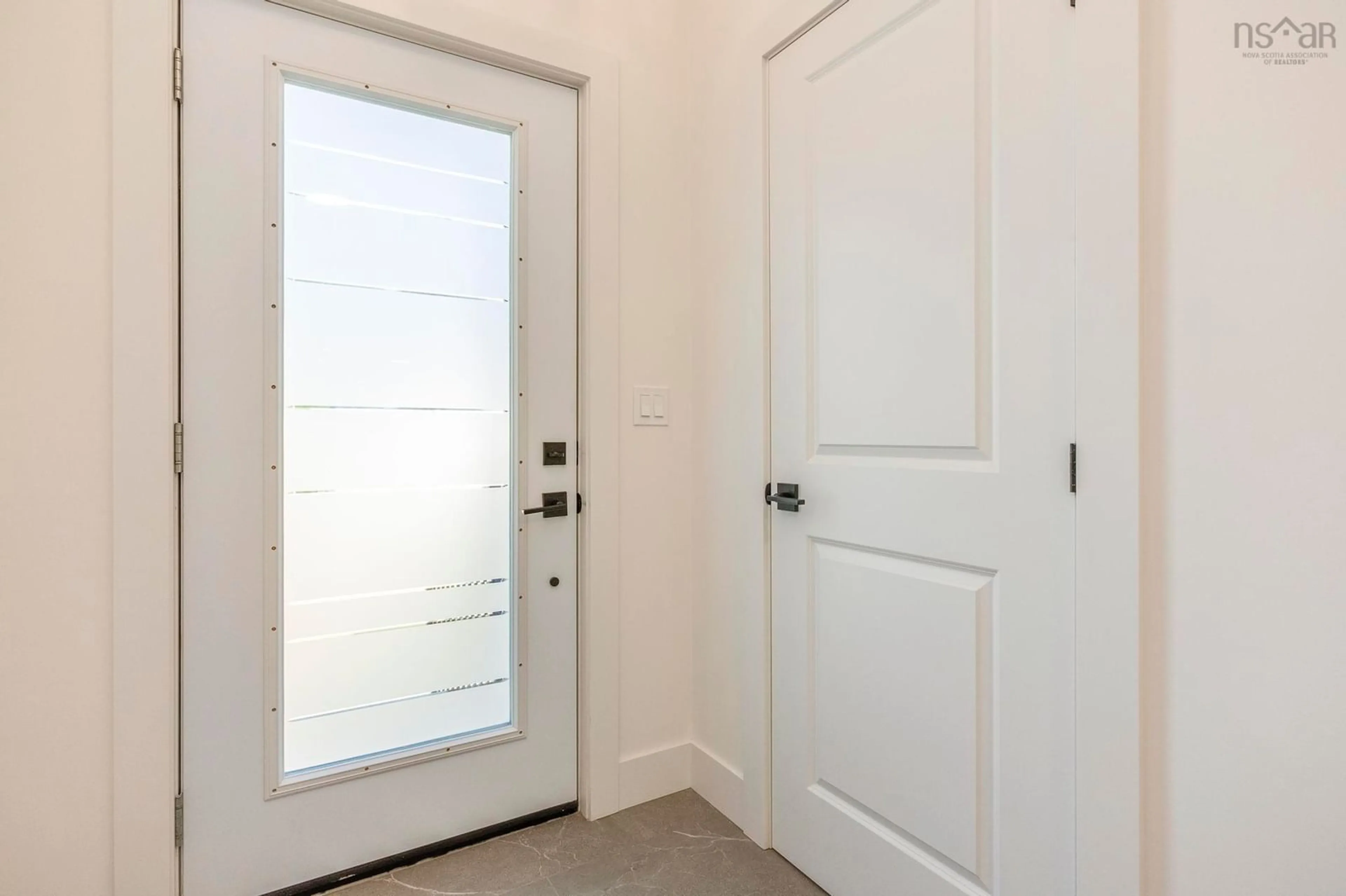 Indoor entryway for 18 Whidden Ave, Wolfville Nova Scotia B4P 0A8