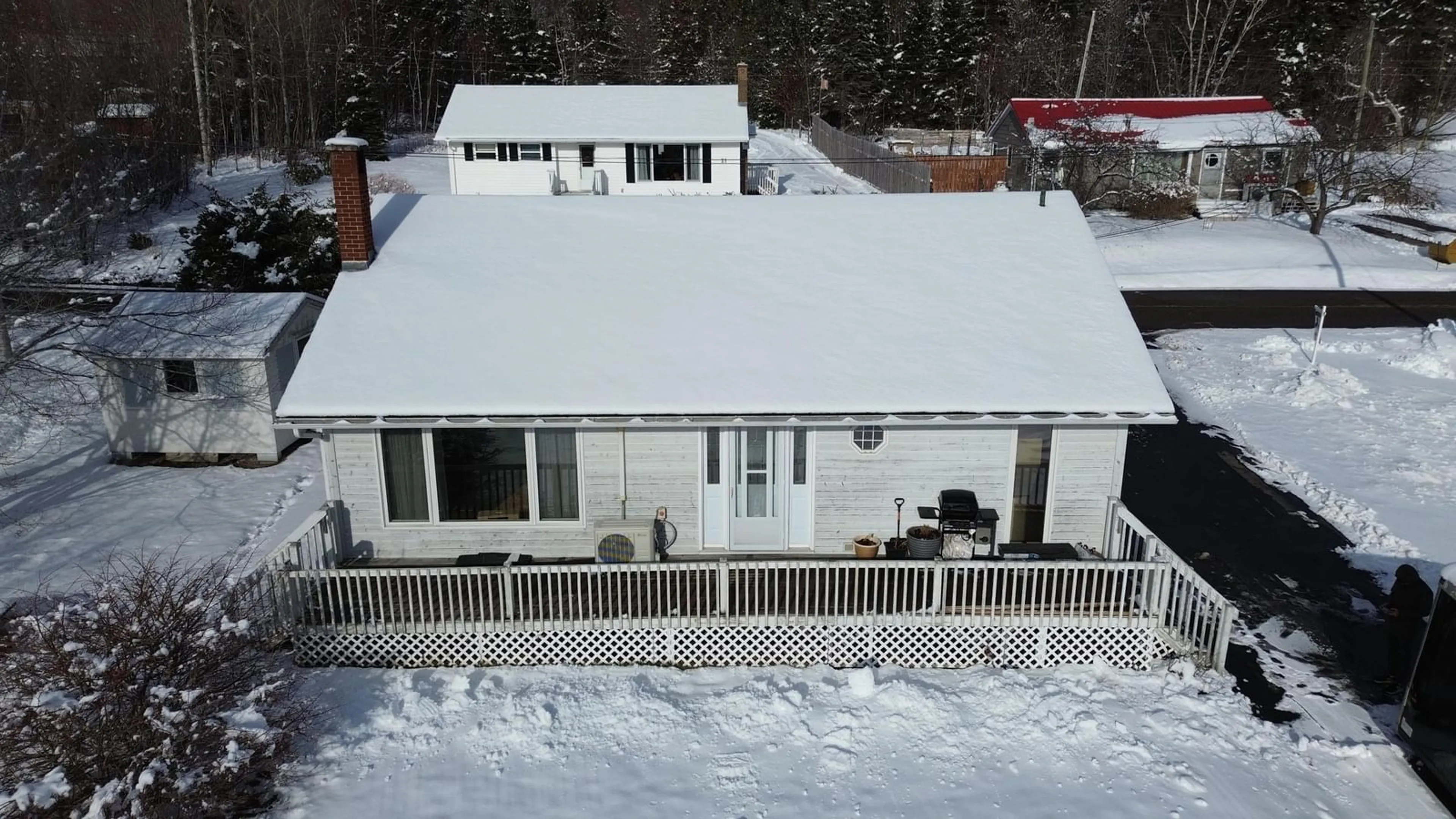 A pic from outside/outdoor area/front of a property/back of a property/a pic from drone, building for 22 Macinnis Rd, Whycocomagh Nova Scotia B0E 3M0
