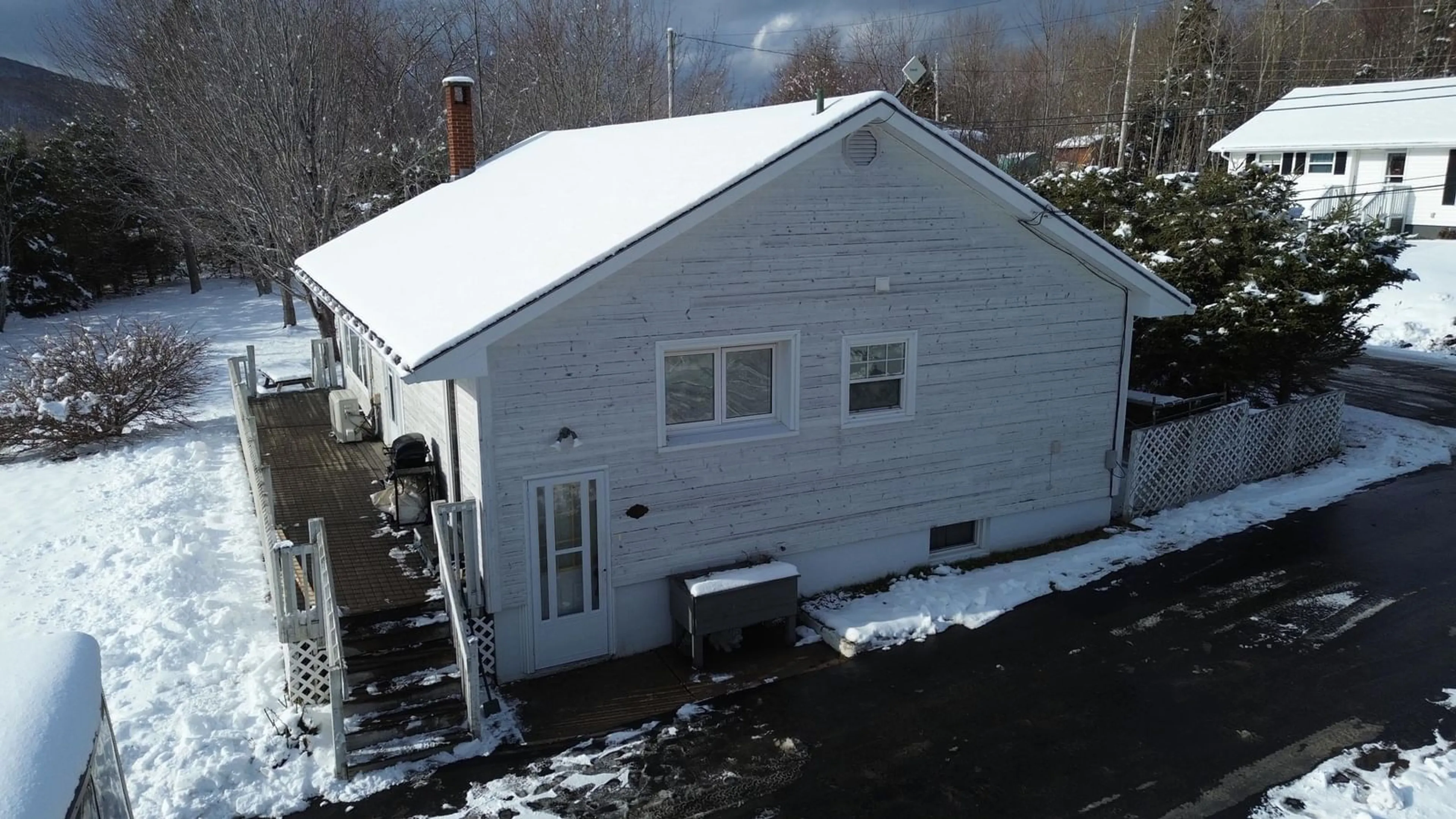 A pic from outside/outdoor area/front of a property/back of a property/a pic from drone, building for 22 Macinnis Rd, Whycocomagh Nova Scotia B0E 3M0