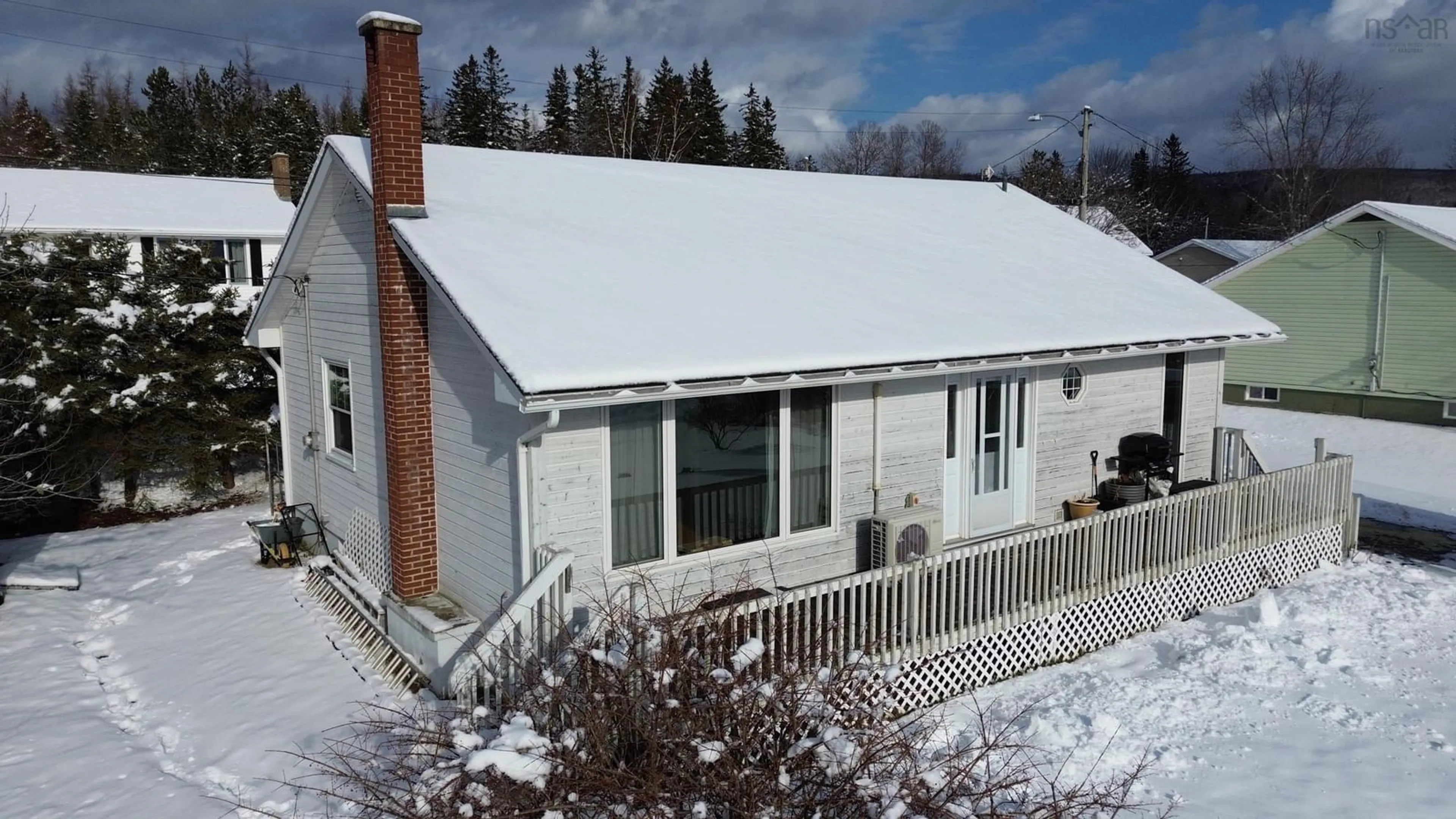 A pic from outside/outdoor area/front of a property/back of a property/a pic from drone, unknown for 22 Macinnis Rd, Whycocomagh Nova Scotia B0E 3M0
