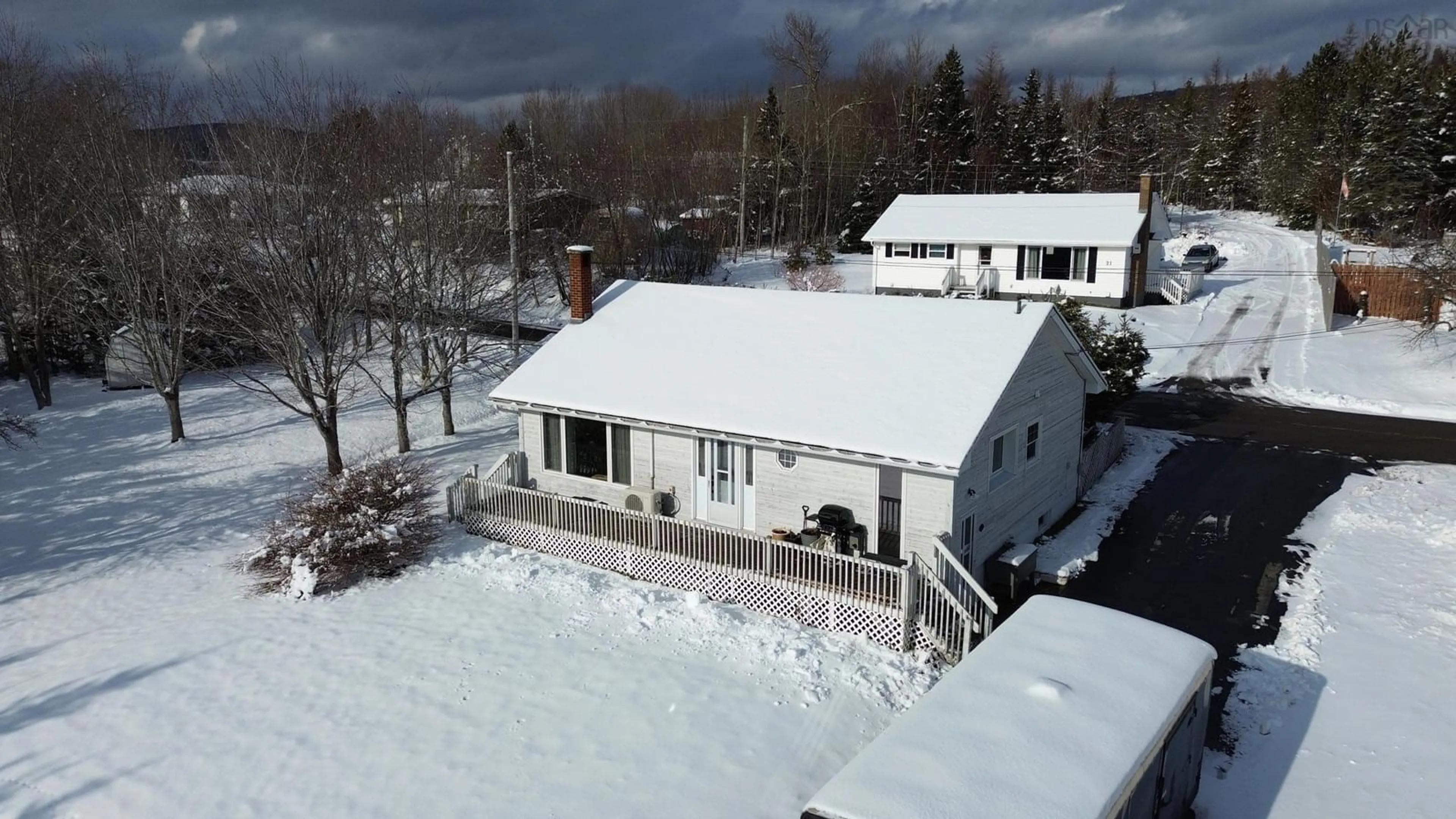 A pic from outside/outdoor area/front of a property/back of a property/a pic from drone, unknown for 22 Macinnis Rd, Whycocomagh Nova Scotia B0E 3M0