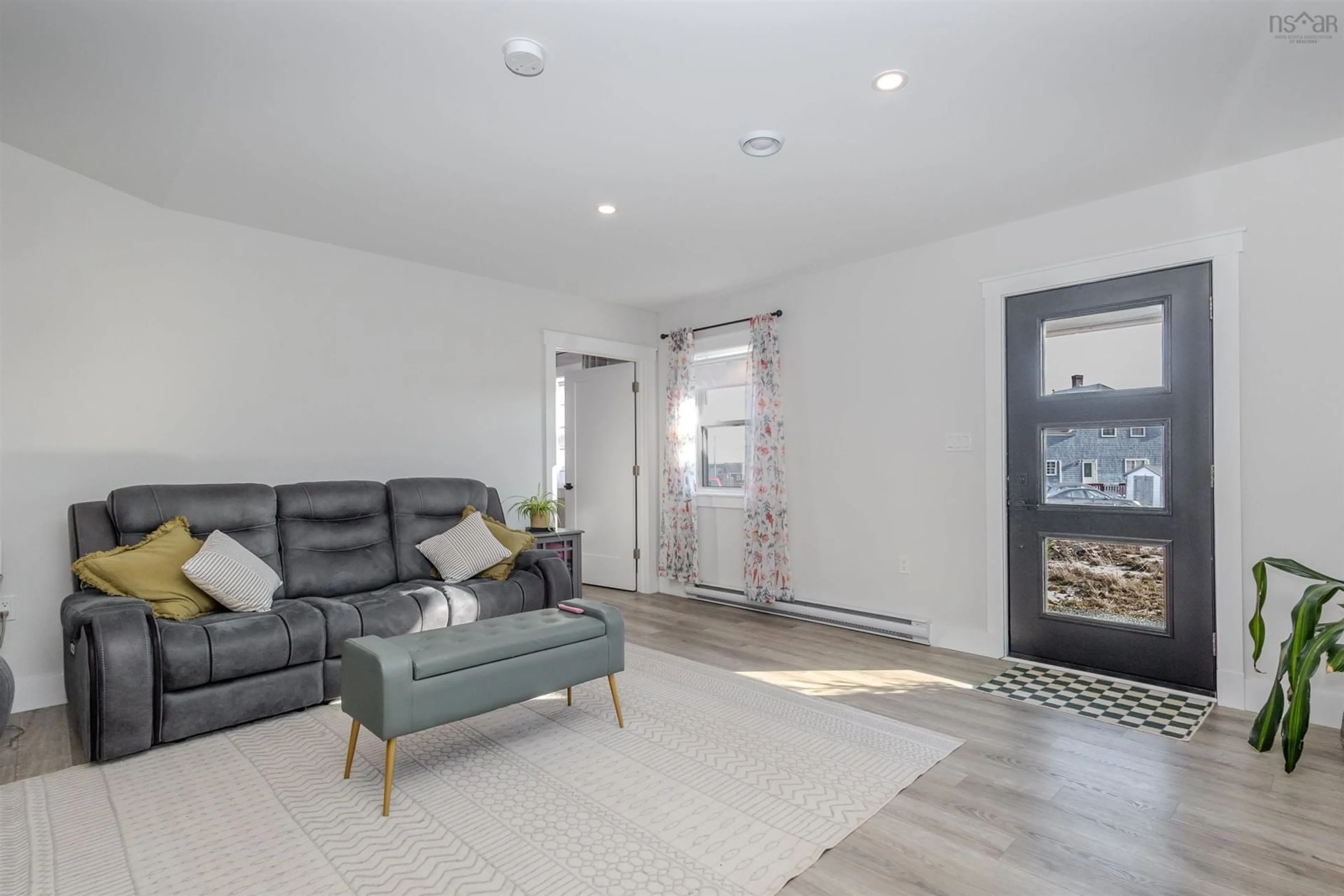 Living room with furniture, unknown for 29 Amy St, Port Morien Nova Scotia B1B 1A1