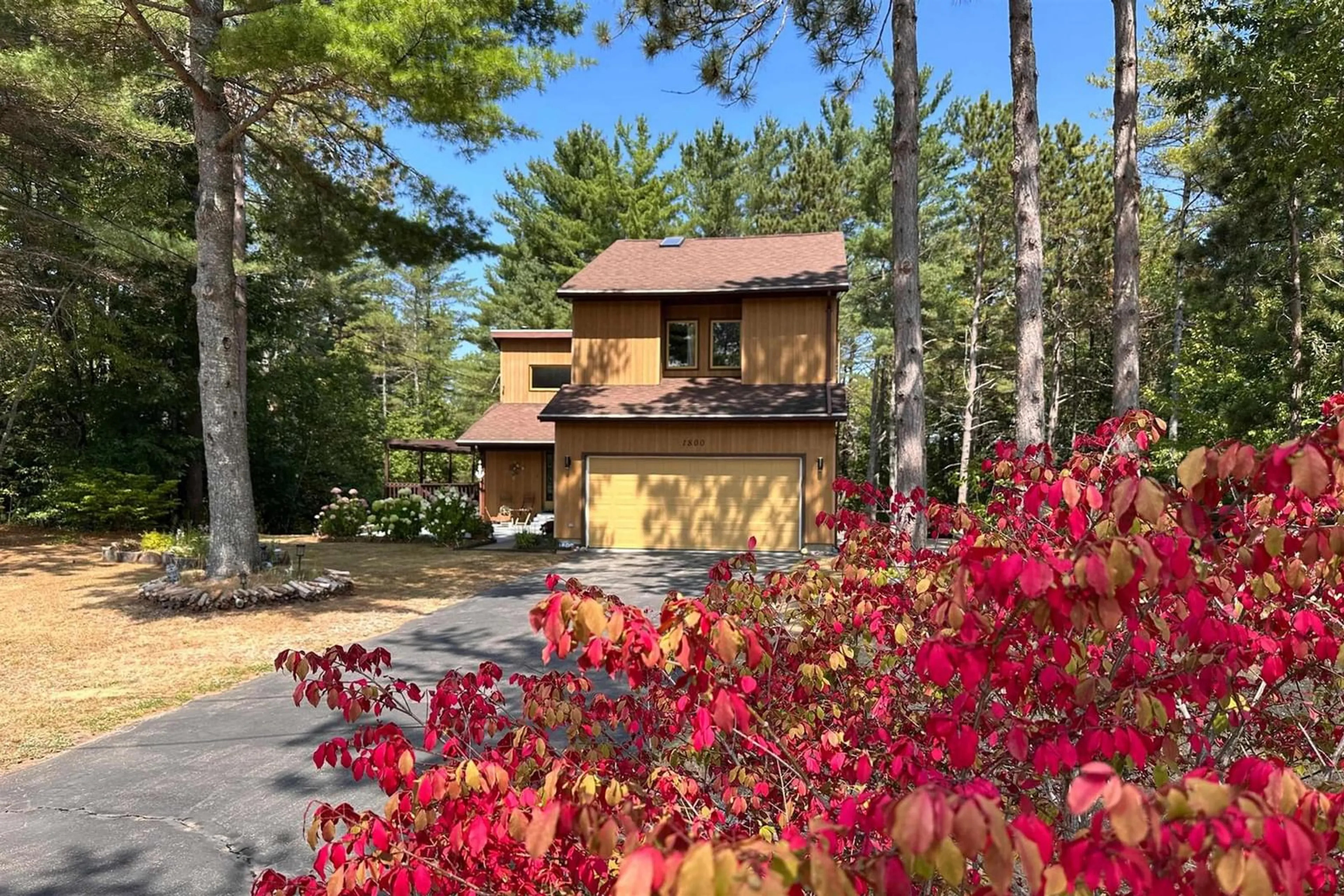 A pic from outside/outdoor area/front of a property/back of a property/a pic from drone, forest/trees view for 1800 Cartier Crt, Kingston Nova Scotia B0P 1R0