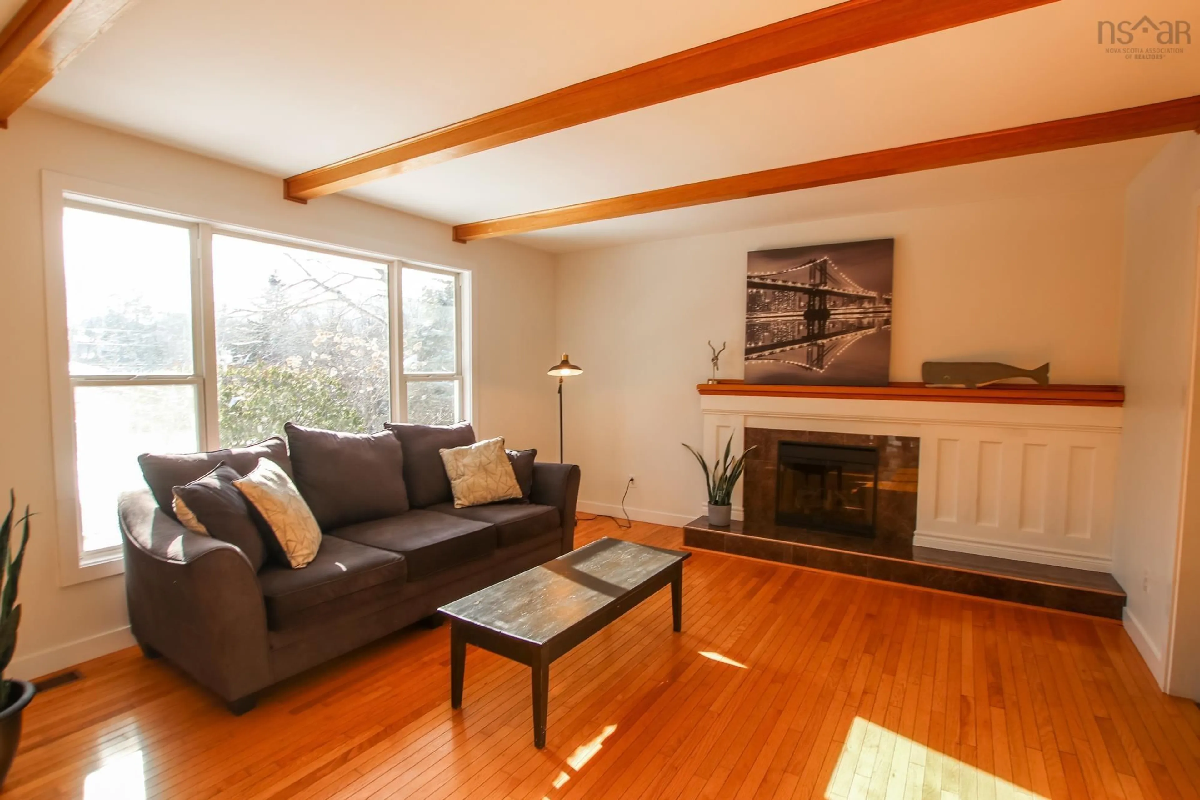 Living room with furniture, wood/laminate floor for 38 Dartmouth Rd, Bedford Nova Scotia B4A 2L2