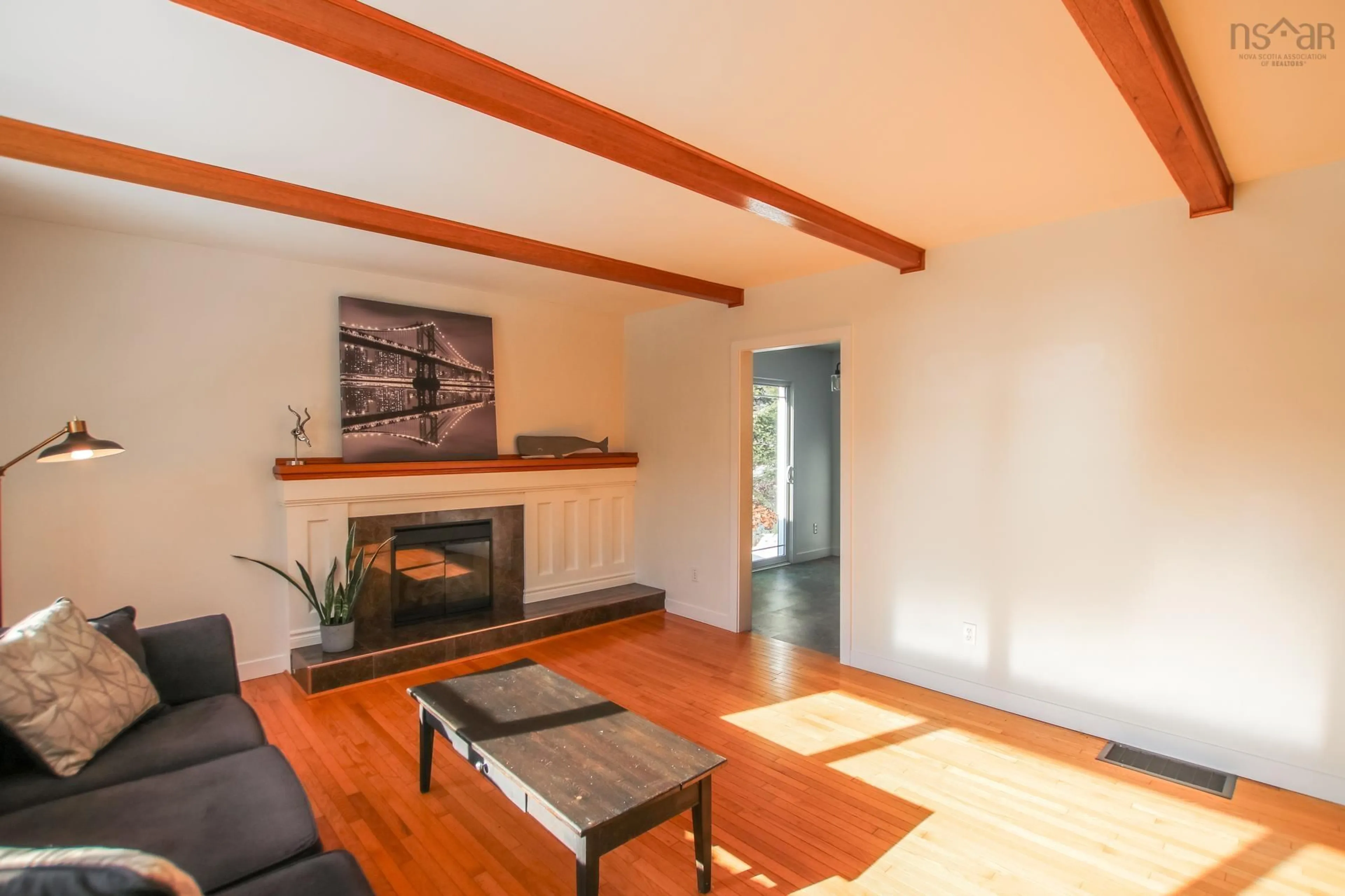 Living room with furniture, wood/laminate floor for 38 Dartmouth Rd, Bedford Nova Scotia B4A 2L2