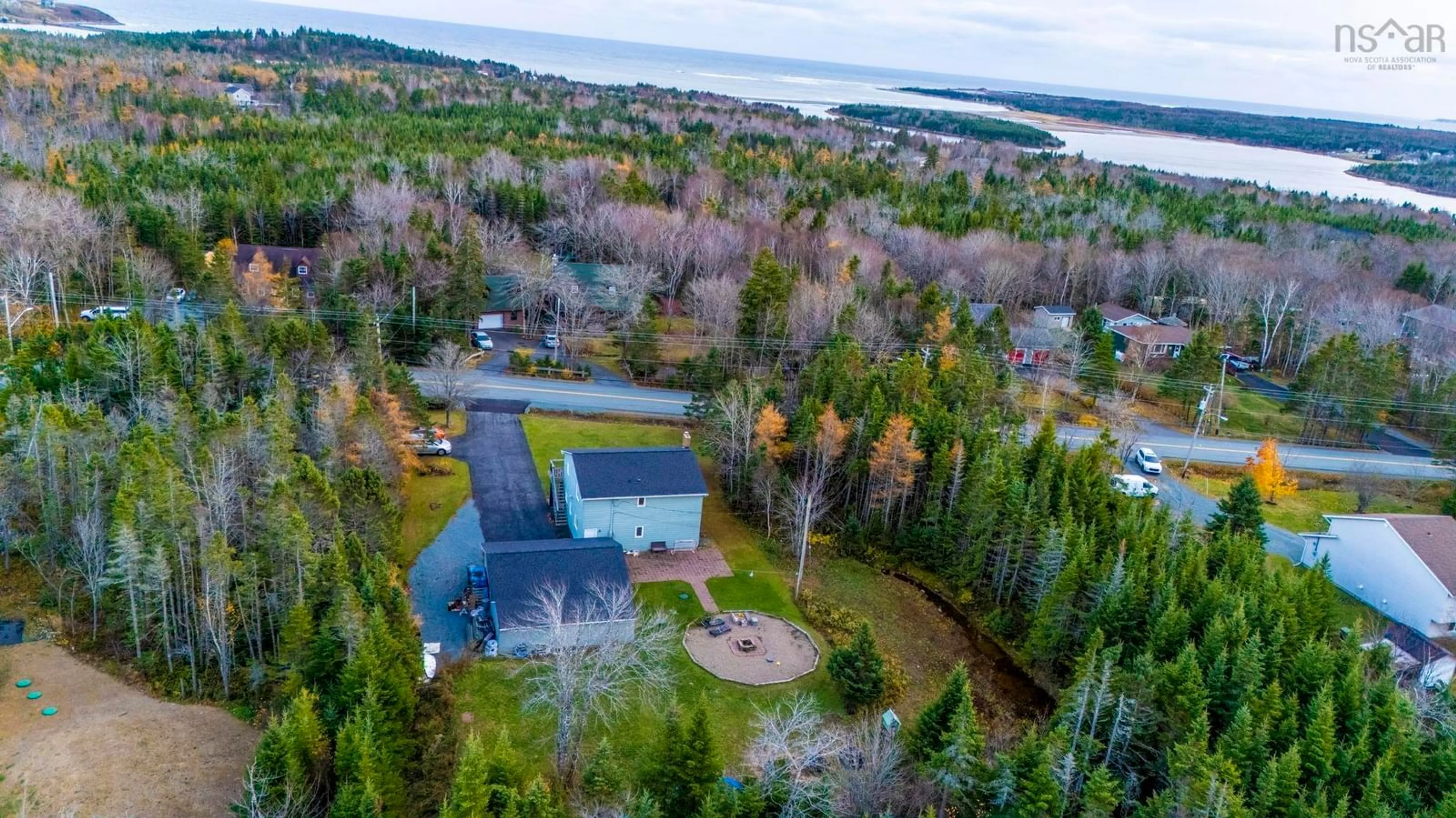 A pic from outside/outdoor area/front of a property/back of a property/a pic from drone, water/lake/river/ocean view for 160 Dyke Rd, Cow Bay Nova Scotia B3G 1K2