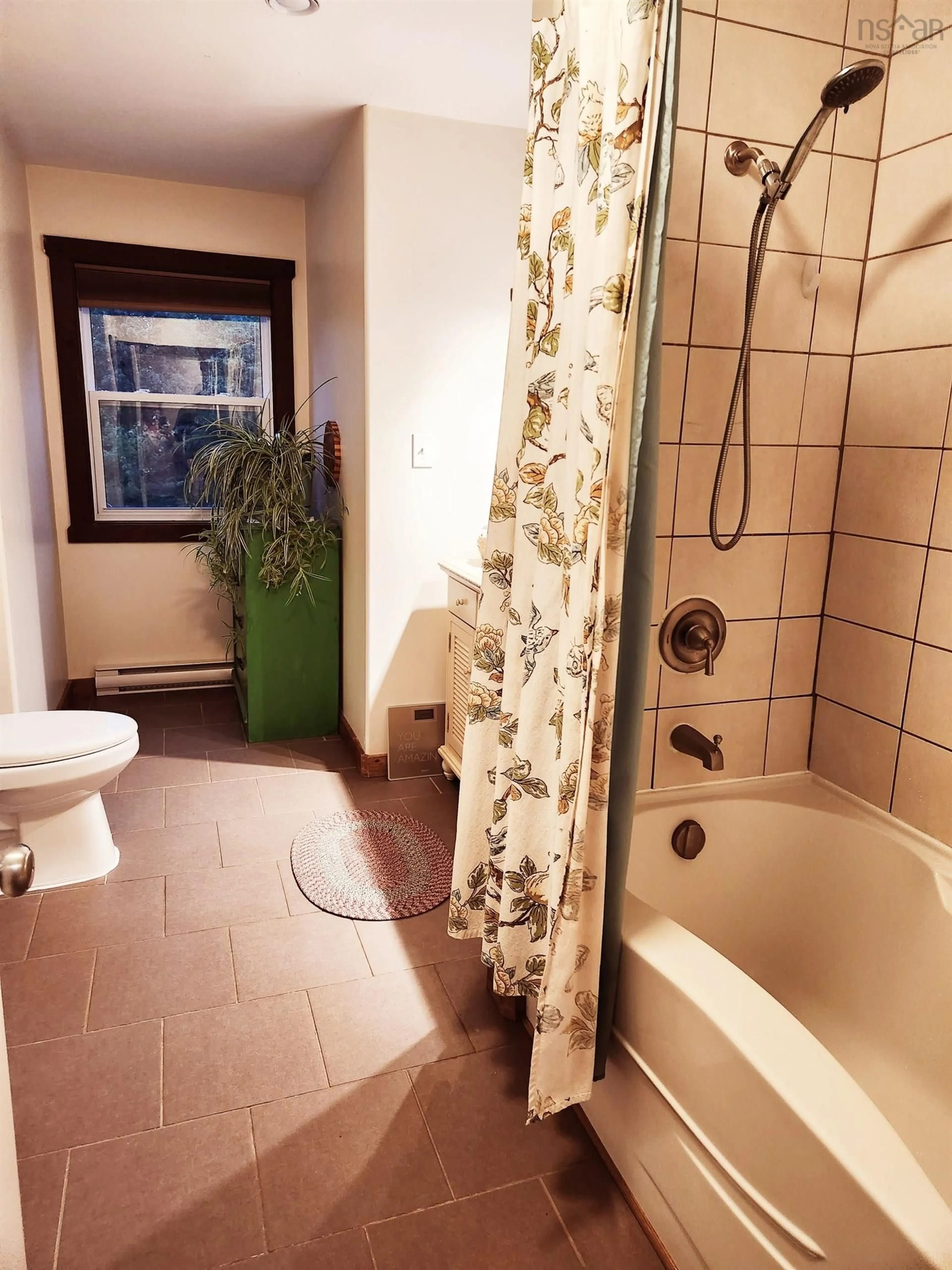 Standard bathroom, ceramic/tile floor for 27859 Cabot Trail Rd, Dingwall Nova Scotia B0C 1G0