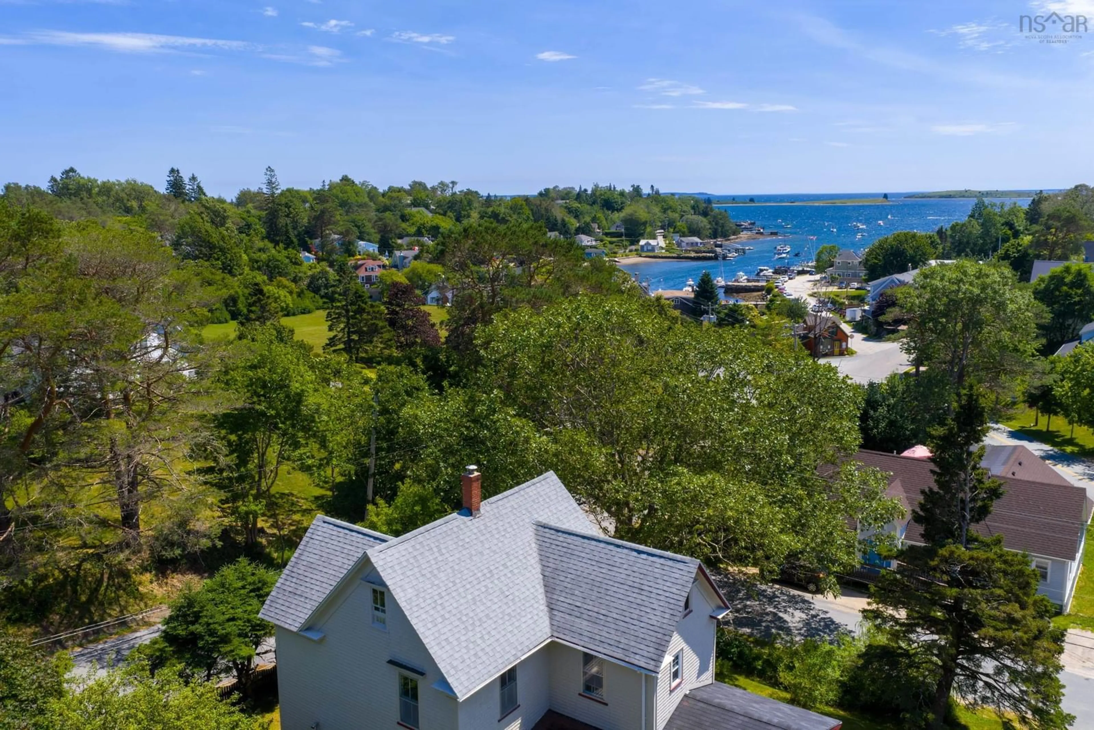 A pic from outside/outdoor area/front of a property/back of a property/a pic from drone, water/lake/river/ocean view for 149 Duke St, Chester Nova Scotia B0J 1J0