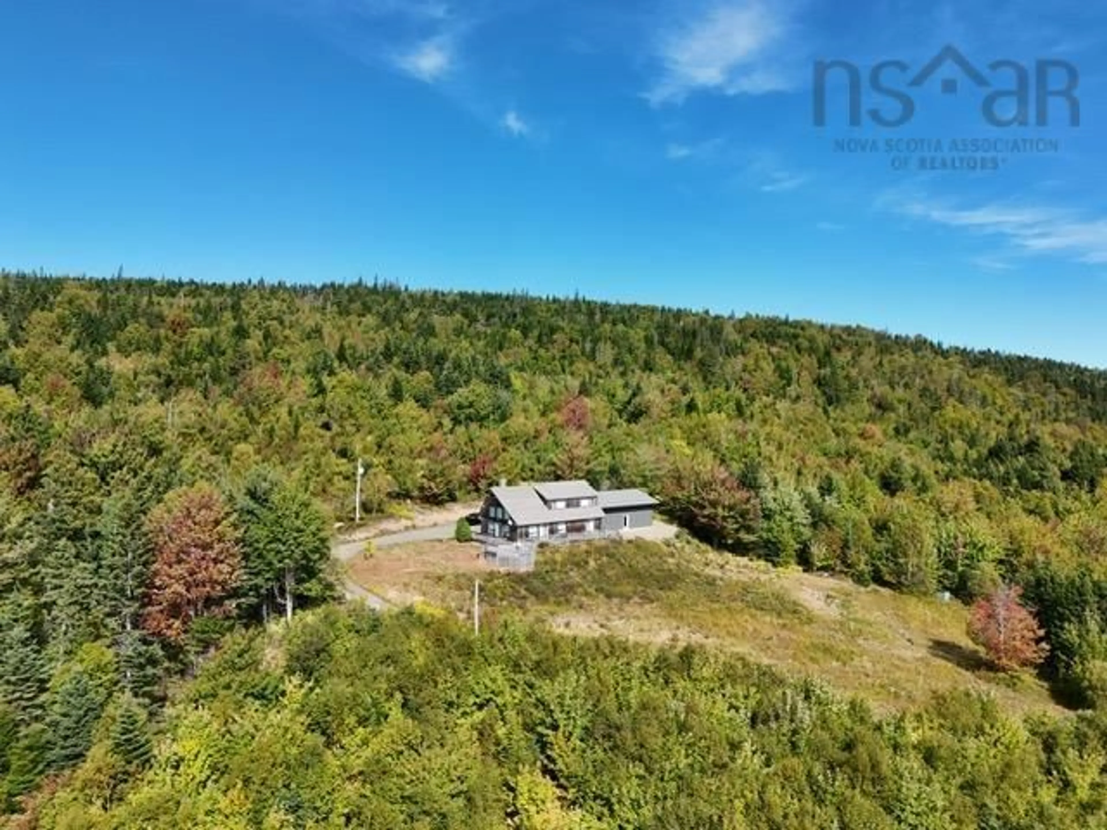 A pic from outside/outdoor area/front of a property/back of a property/a pic from drone, forest/trees view for 935 Big Harbour Rd, Big Harbour Nova Scotia B0E 1B0