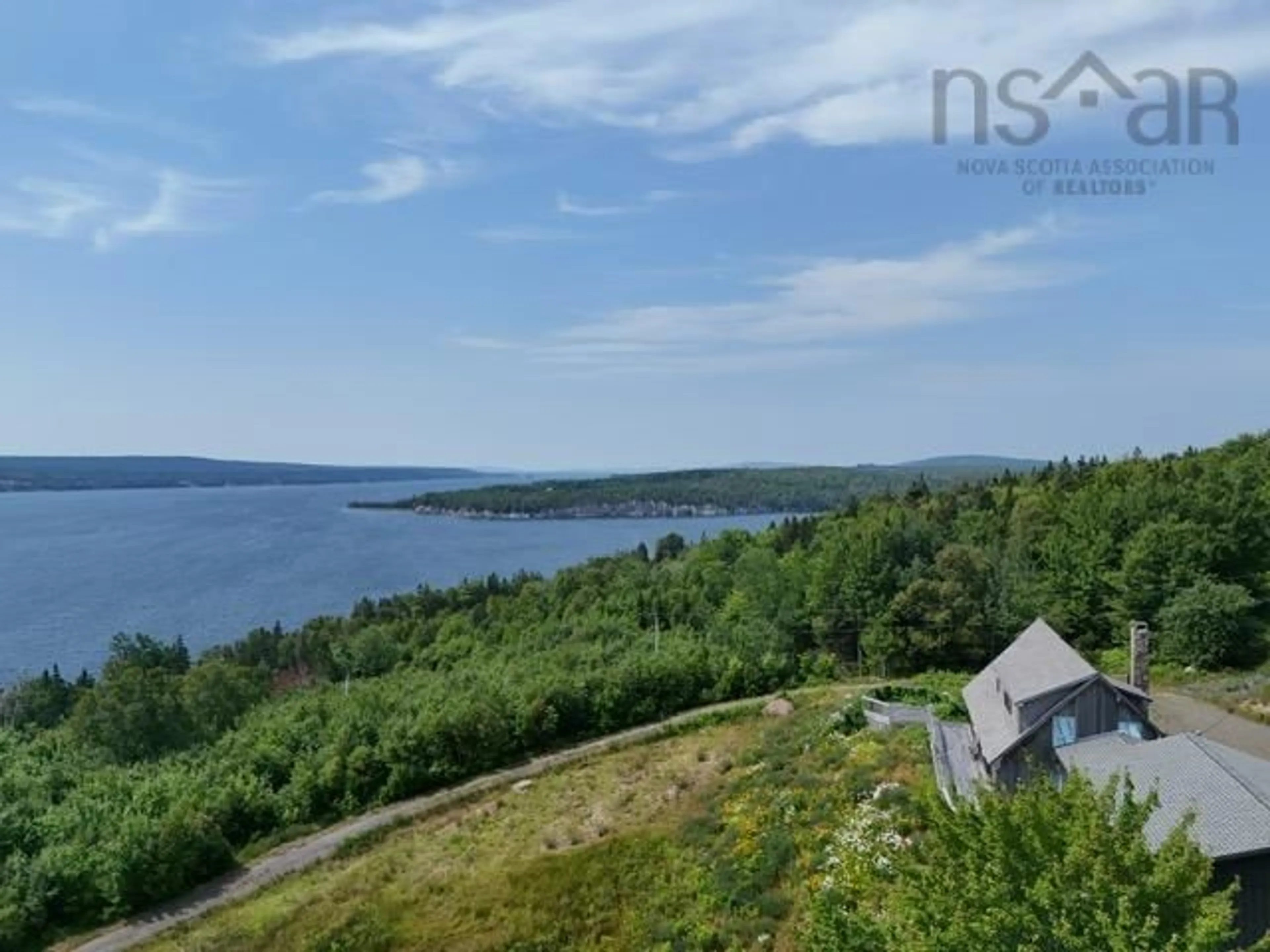 A pic from outside/outdoor area/front of a property/back of a property/a pic from drone, water/lake/river/ocean view for 935 Big Harbour Rd, Big Harbour Nova Scotia B0E 1B0
