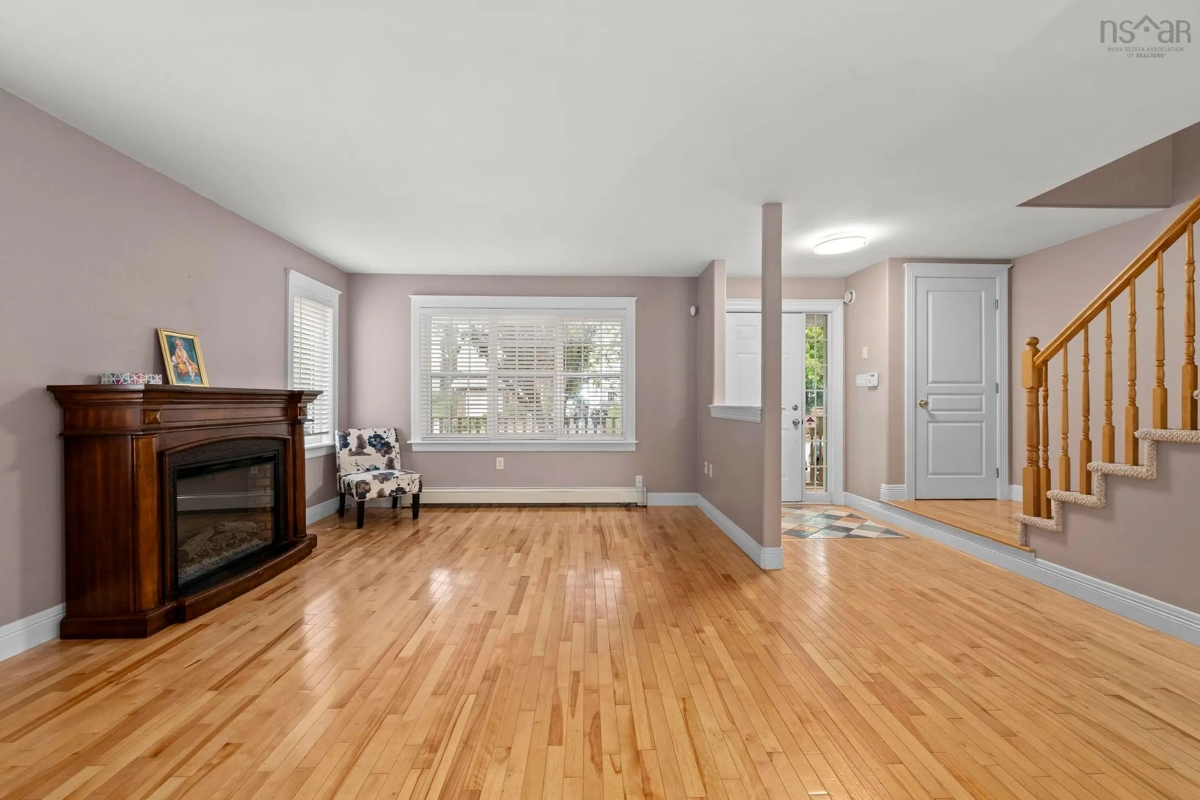 Living room with furniture, wood/laminate floor for 83 Red Fern Terr, Halifax Nova Scotia B3S 1K9