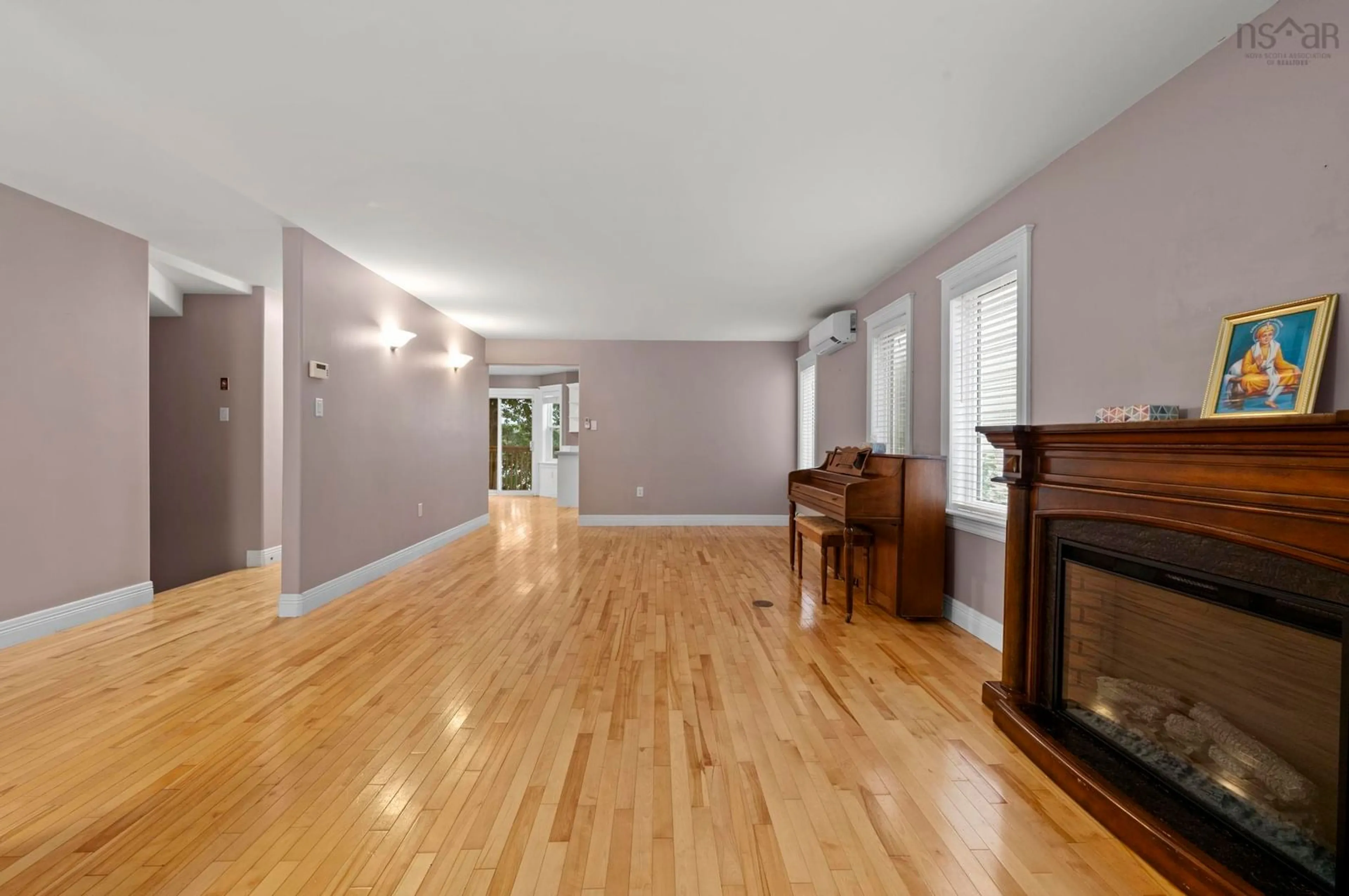 Living room with furniture, wood/laminate floor for 83 Red Fern Terr, Halifax Nova Scotia B3S 1K9