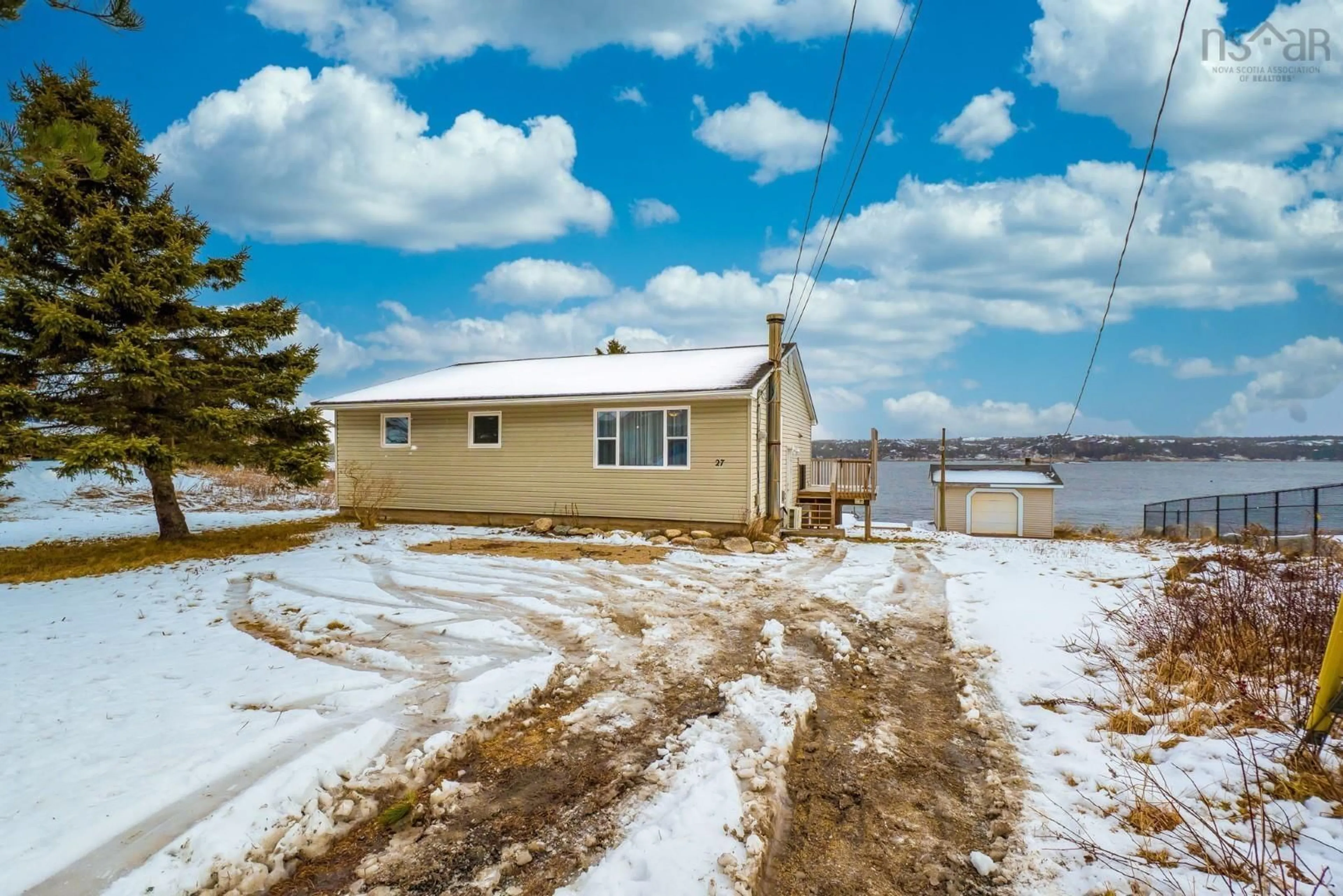 A pic from outside/outdoor area/front of a property/back of a property/a pic from drone, water/lake/river/ocean view for 27 Back Lane, Terence Bay Nova Scotia B3J 1Y3