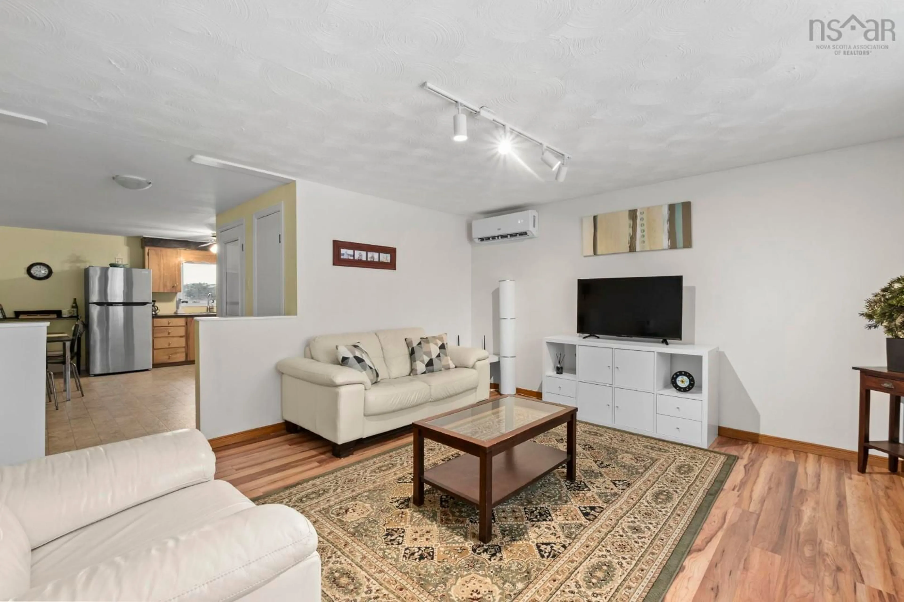 Living room with furniture, unknown for 27 Back Lane, Terence Bay Nova Scotia B3J 1Y3