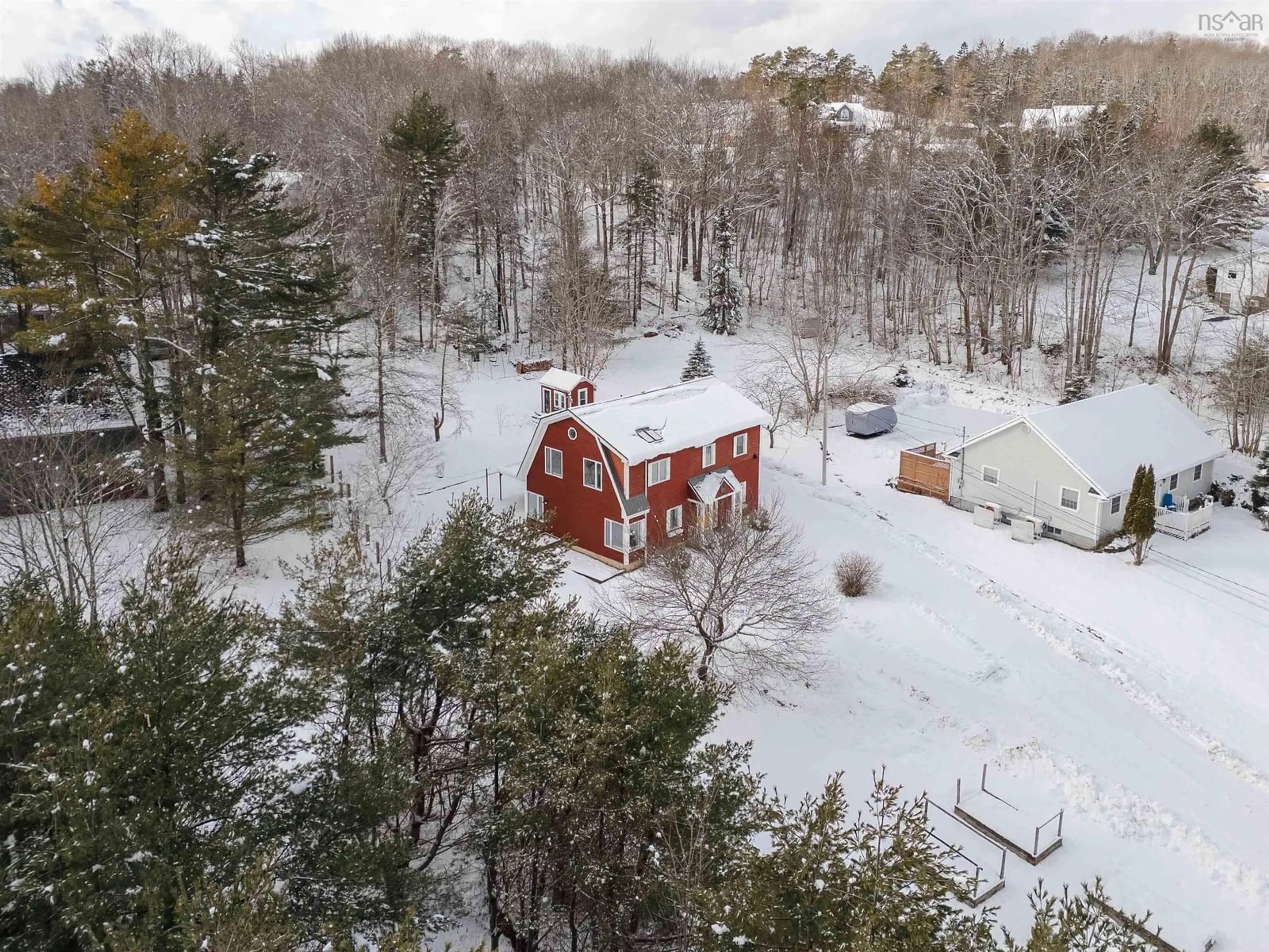 A pic from outside/outdoor area/front of a property/back of a property/a pic from drone, forest/trees view for 21 Long Hill Rd, Mahone Bay Nova Scotia B0J 1E0