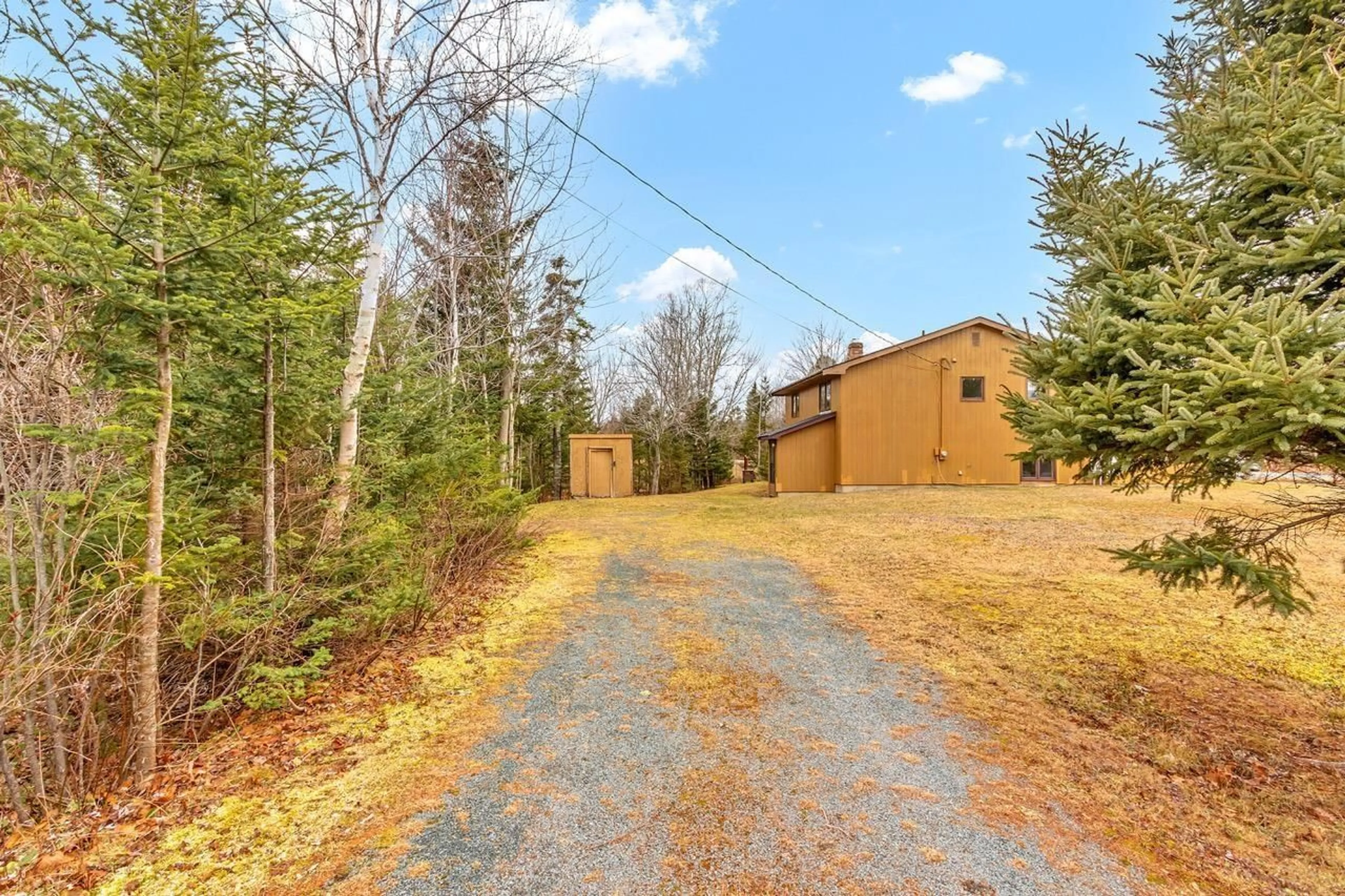A pic from outside/outdoor area/front of a property/back of a property/a pic from drone, forest/trees view for 1 Corrie Lane, West Porters Lake Nova Scotia B3E 1L1