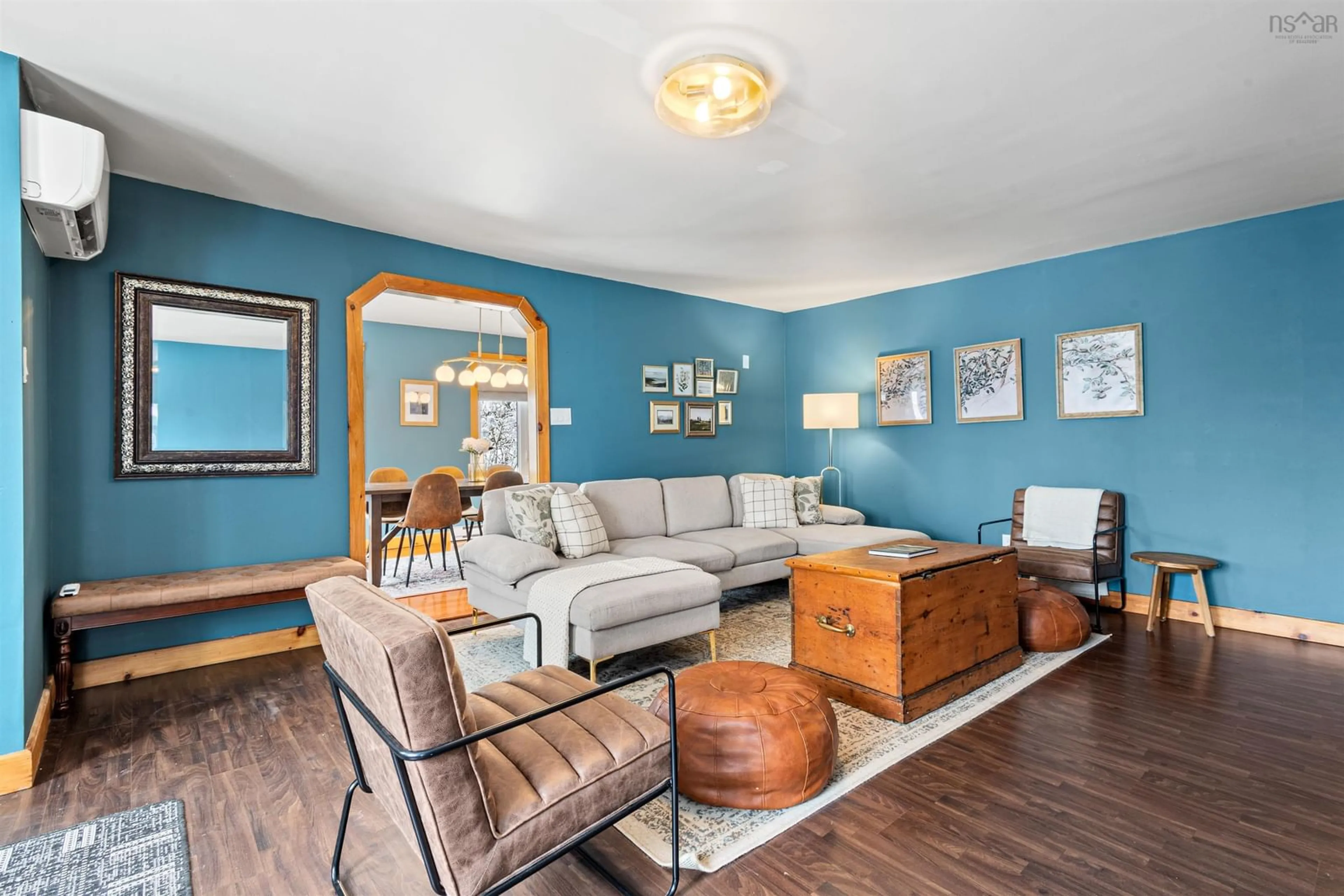 Living room with furniture, wood/laminate floor for 202 Gaspereau Ave, Wolfville Nova Scotia B4P 2E6