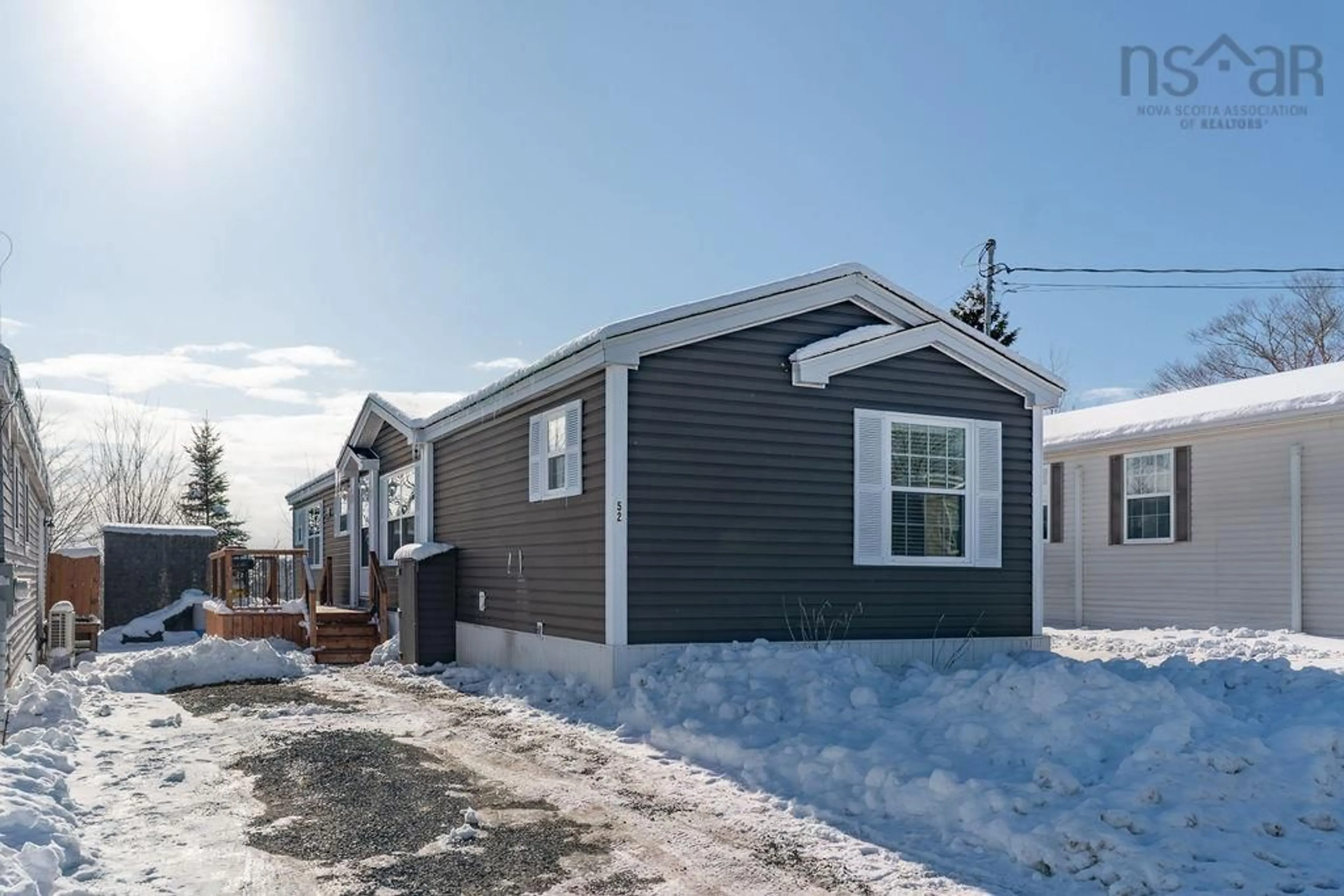 Home with vinyl exterior material, street for 52 Manor Dr, Lower Sackville Nova Scotia B4C 2P1
