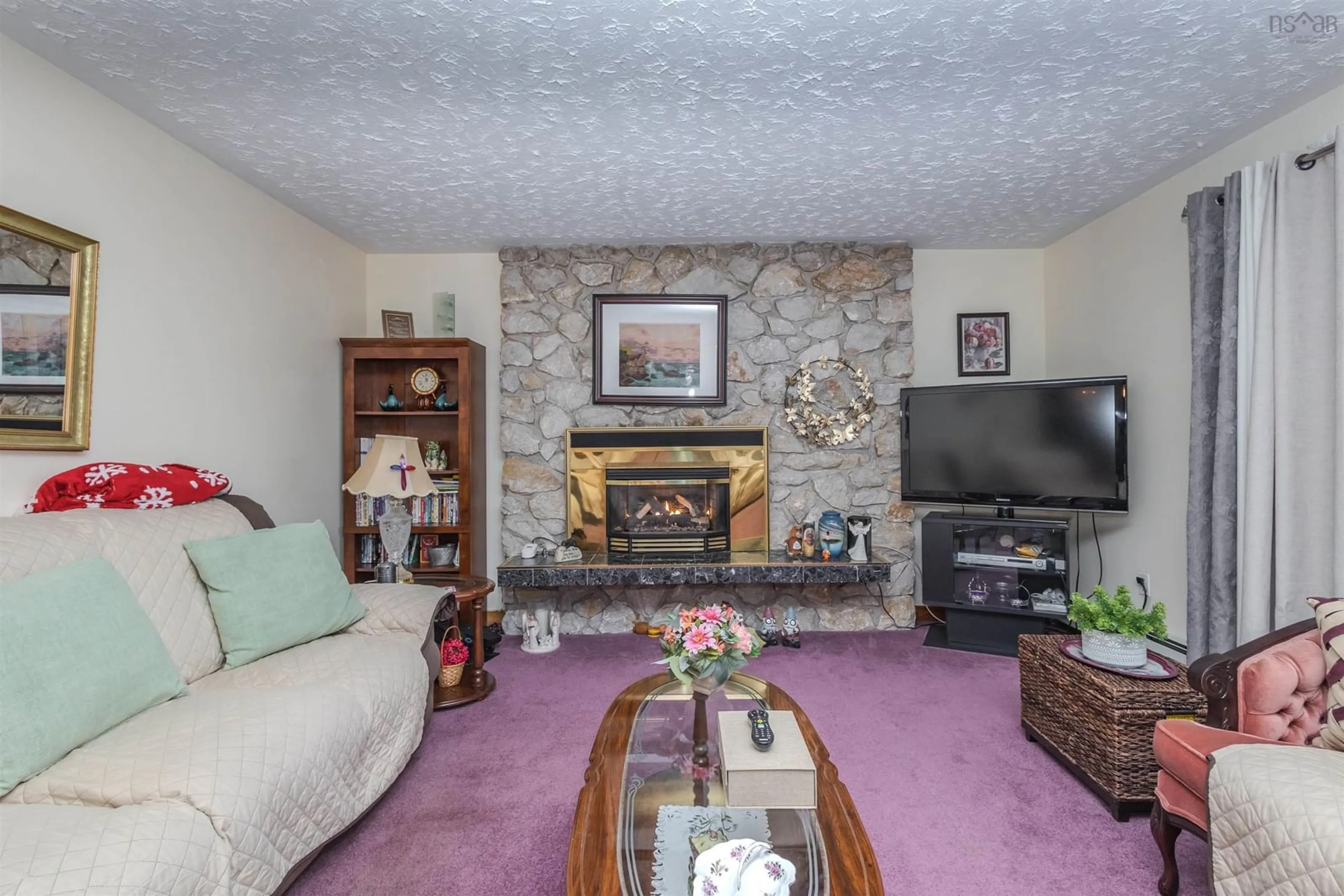 Living room with furniture, carpet floor for 7 Elder Vista Dr, Howie Centre Nova Scotia B1L 1C4