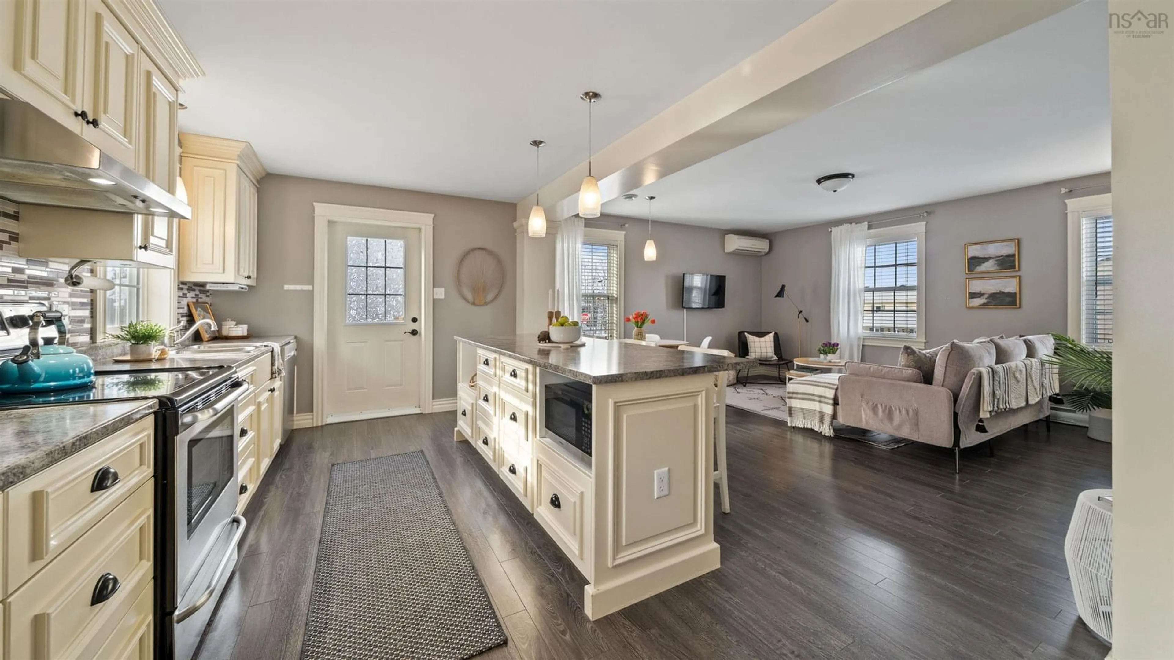 Open concept kitchen, ceramic/tile floor for 113 Pleasant St, Wolfville Nova Scotia B4P 2R7
