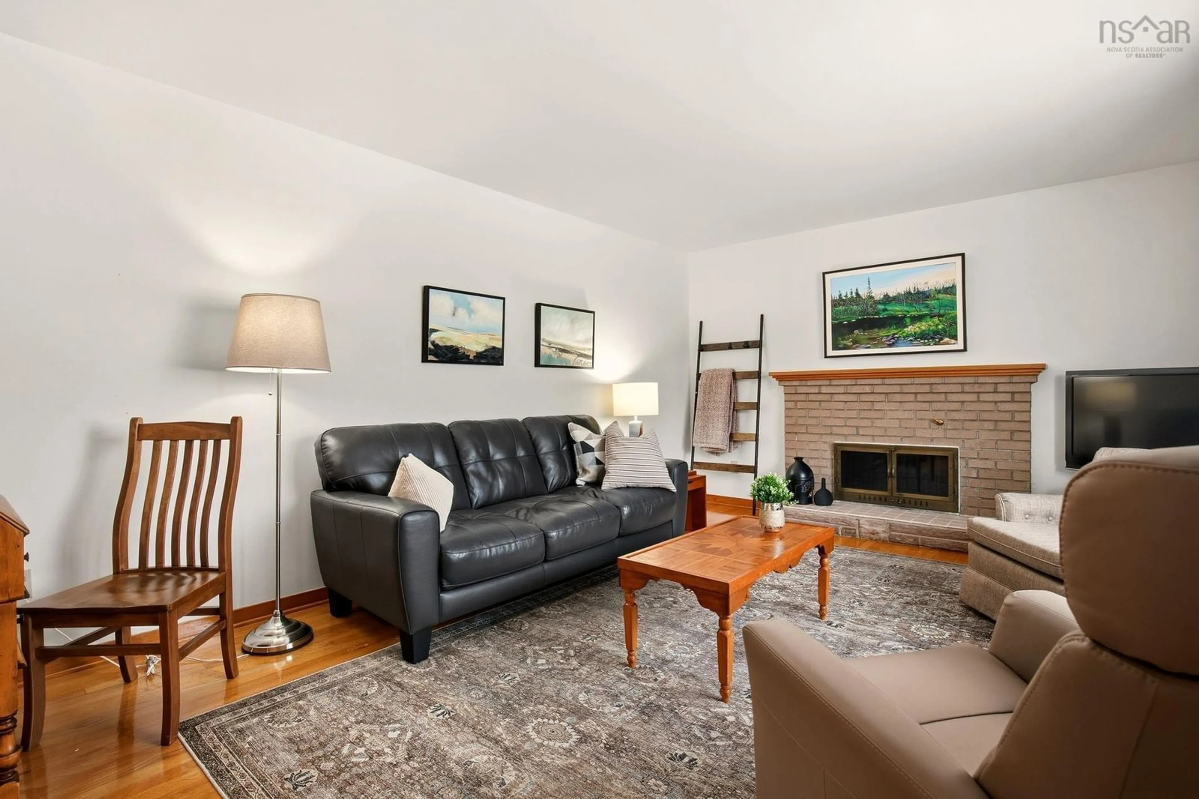 Living room with furniture, wood/laminate floor for 21 Macrae Ave, Dartmouth Nova Scotia B2Y 1Z4