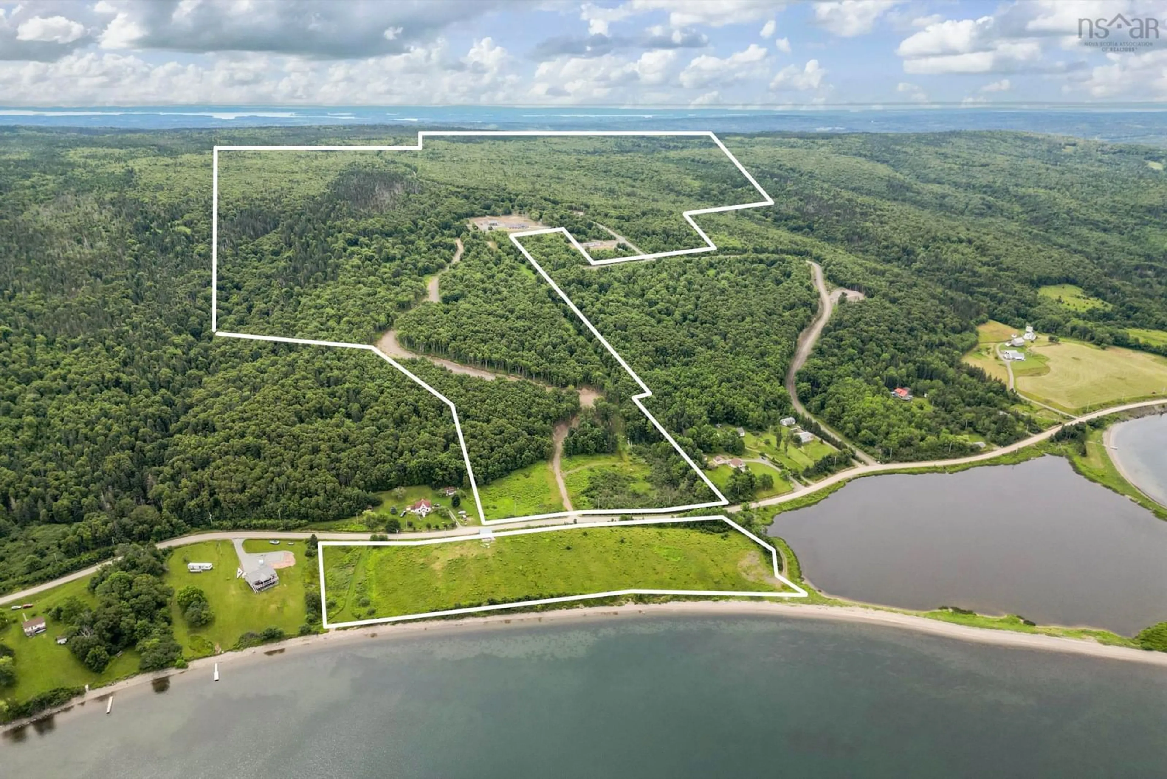 A pic from outside/outdoor area/front of a property/back of a property/a pic from drone, water/lake/river/ocean view for 11 and 23 Golden View Drive, St George's Channel Nova Scotia B0E 3K0