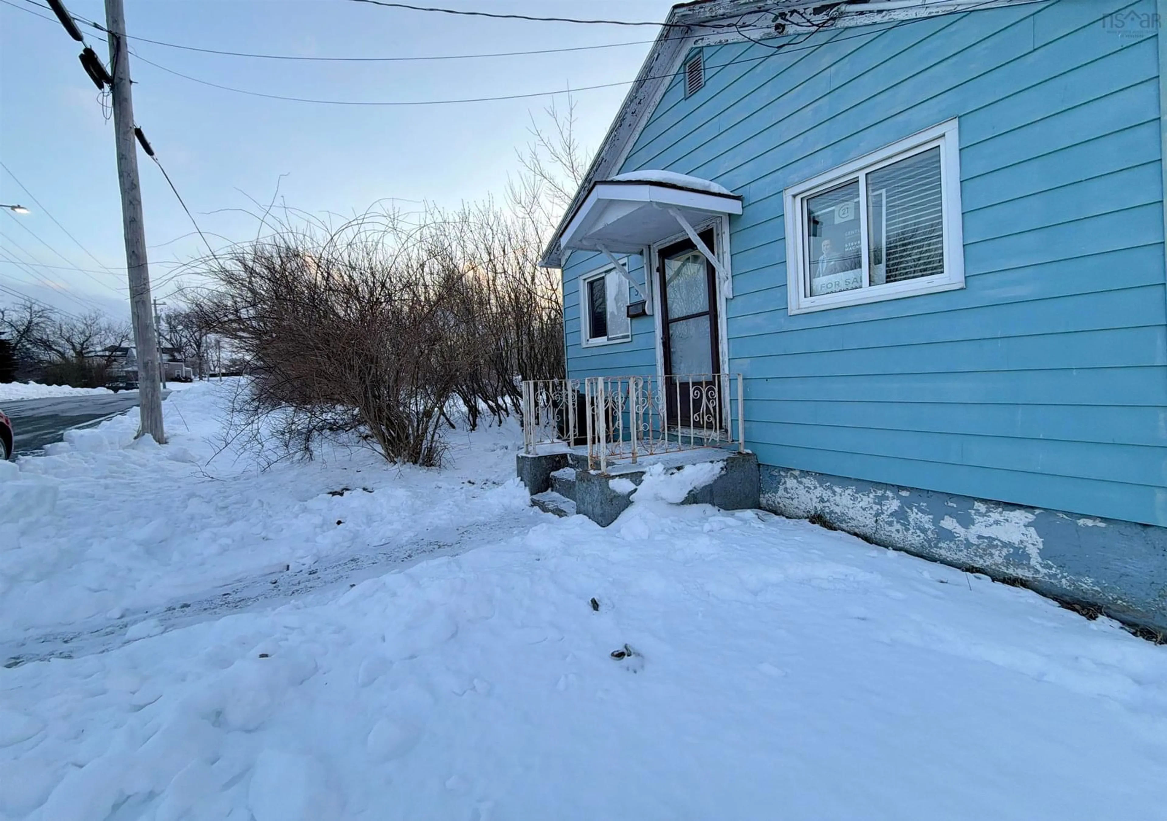 A pic from outside/outdoor area/front of a property/back of a property/a pic from drone, street for 385 Gibbon St, New Waterford Nova Scotia B1H 3N3