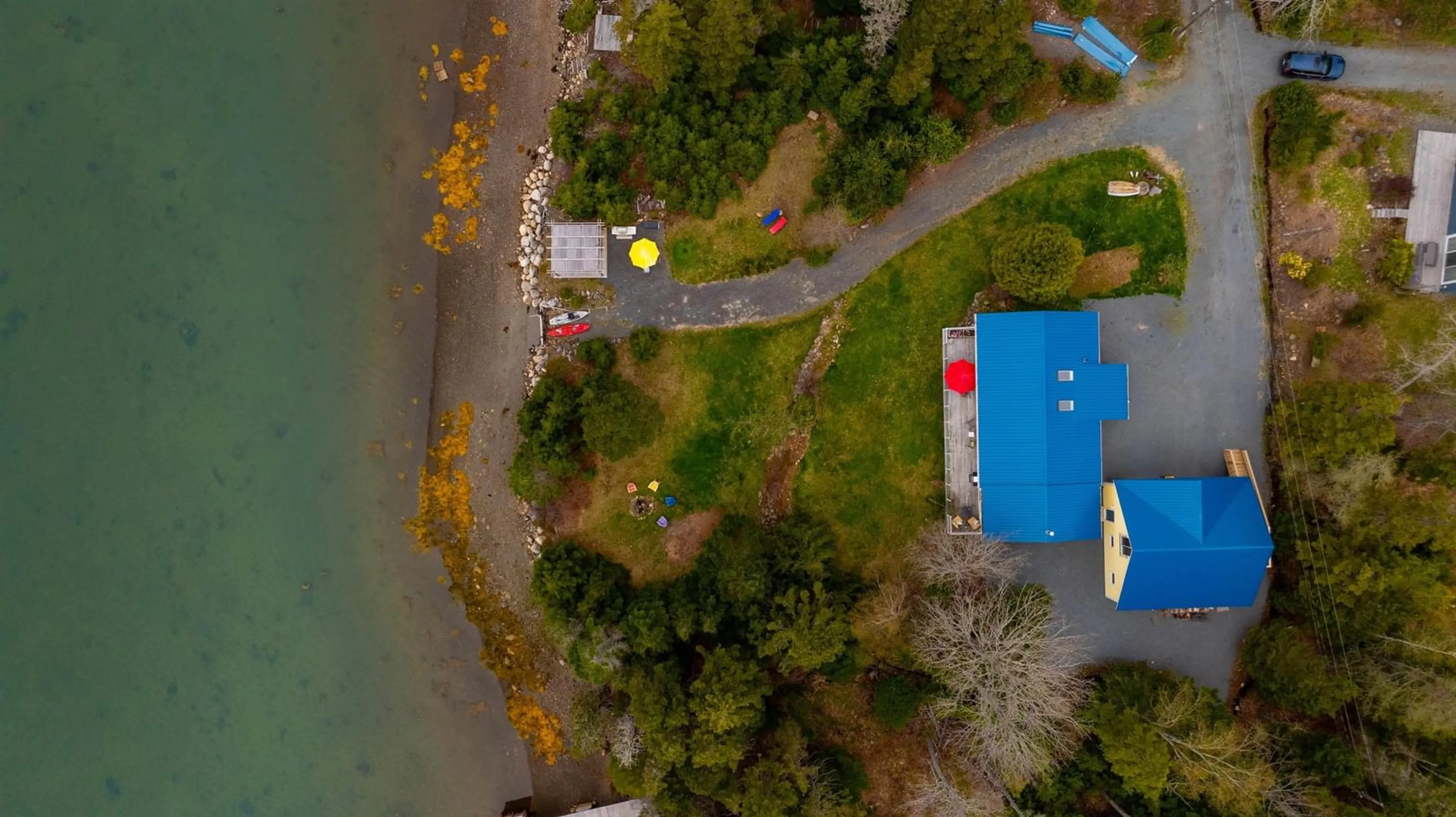A pic from outside/outdoor area/front of a property/back of a property/a pic from drone, water/lake/river/ocean view for 42 Goldfinch Lane, Heckmans Island Nova Scotia B0J 2C0