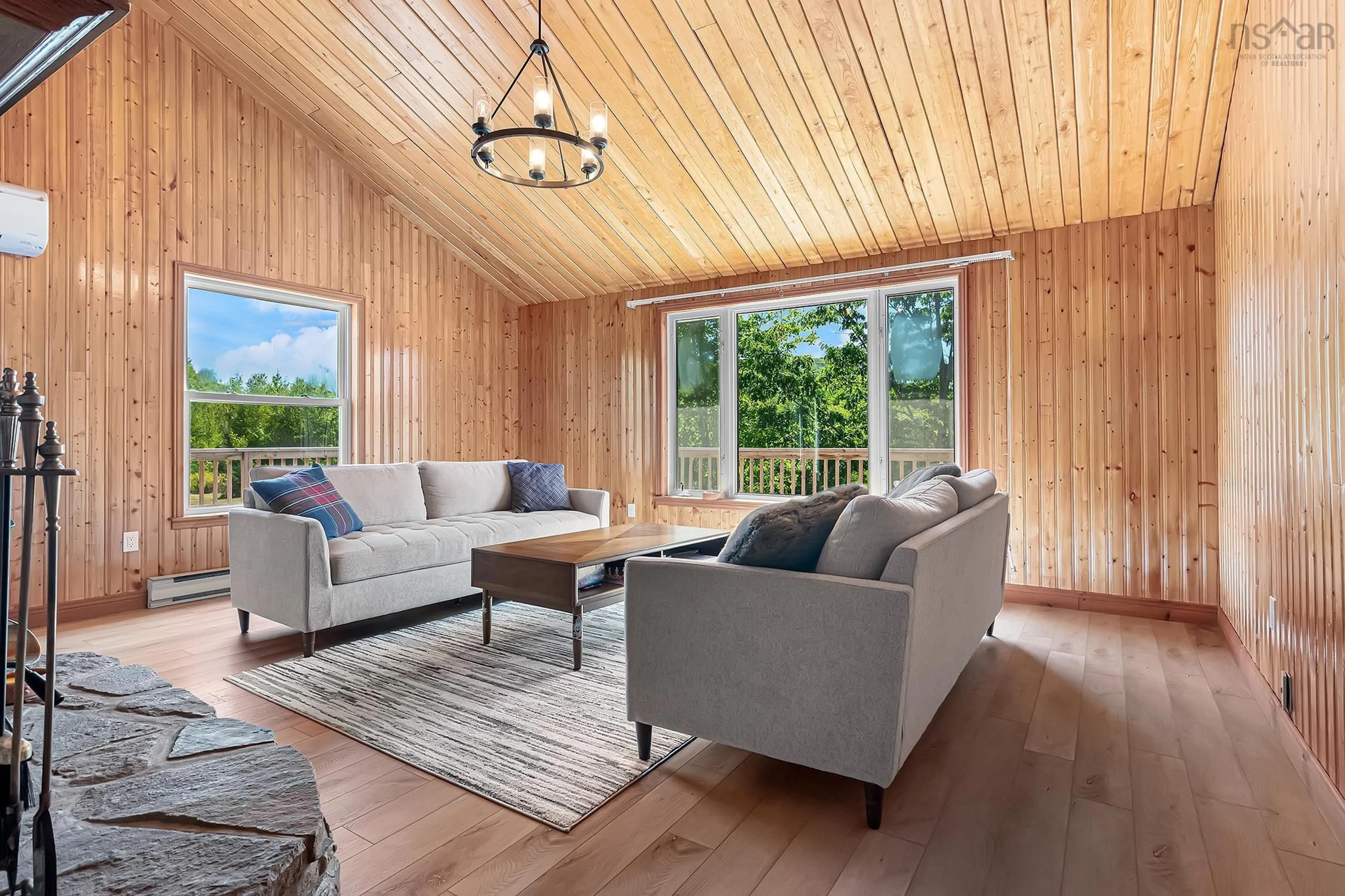 Living room with furniture, wood/laminate floor for 420 Highway 246, Wentworth Nova Scotia B0M 1Z0