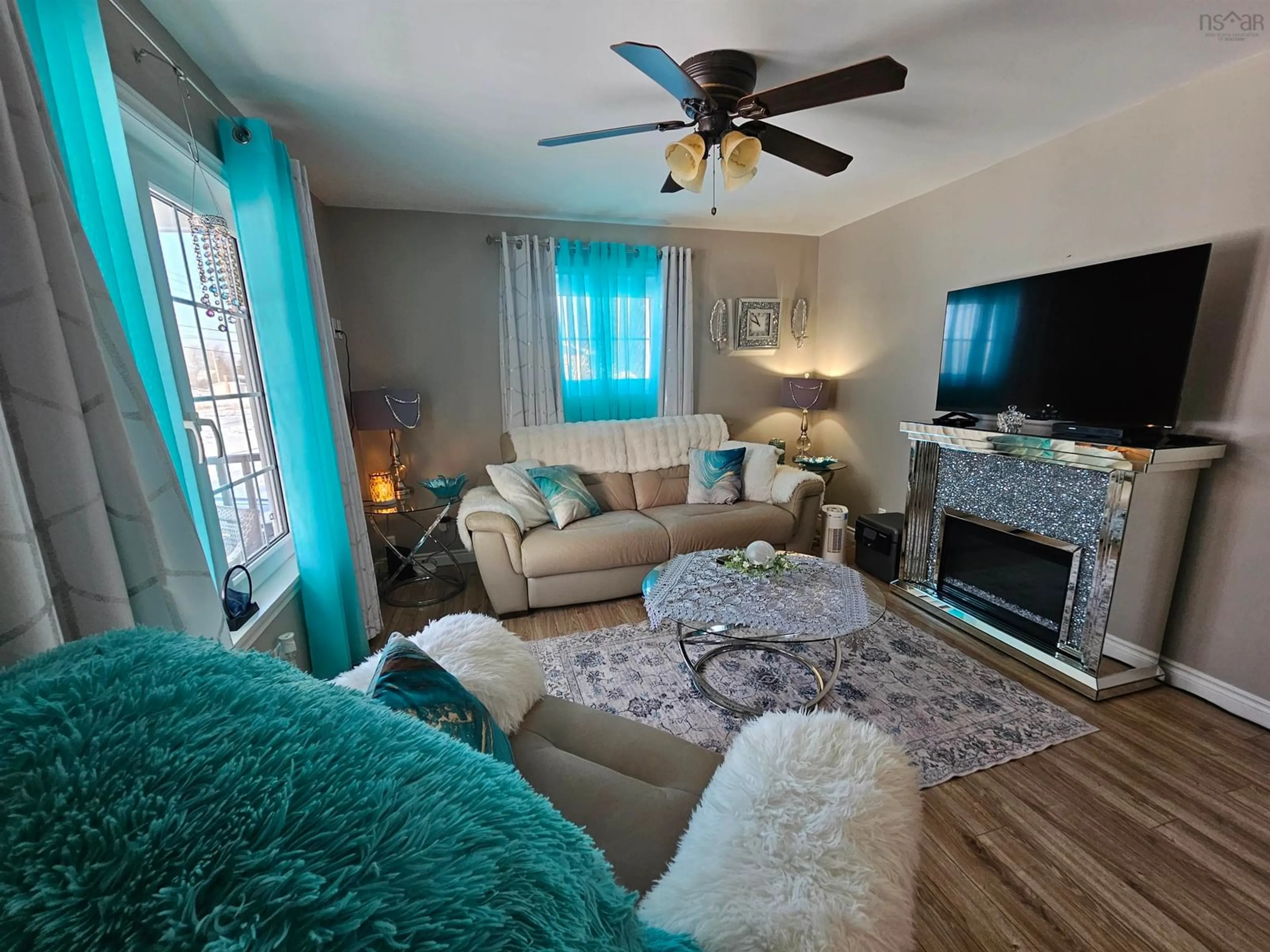 Living room with furniture, unknown for 186 Legatto St, Sydney Mines Nova Scotia B1V 2S7