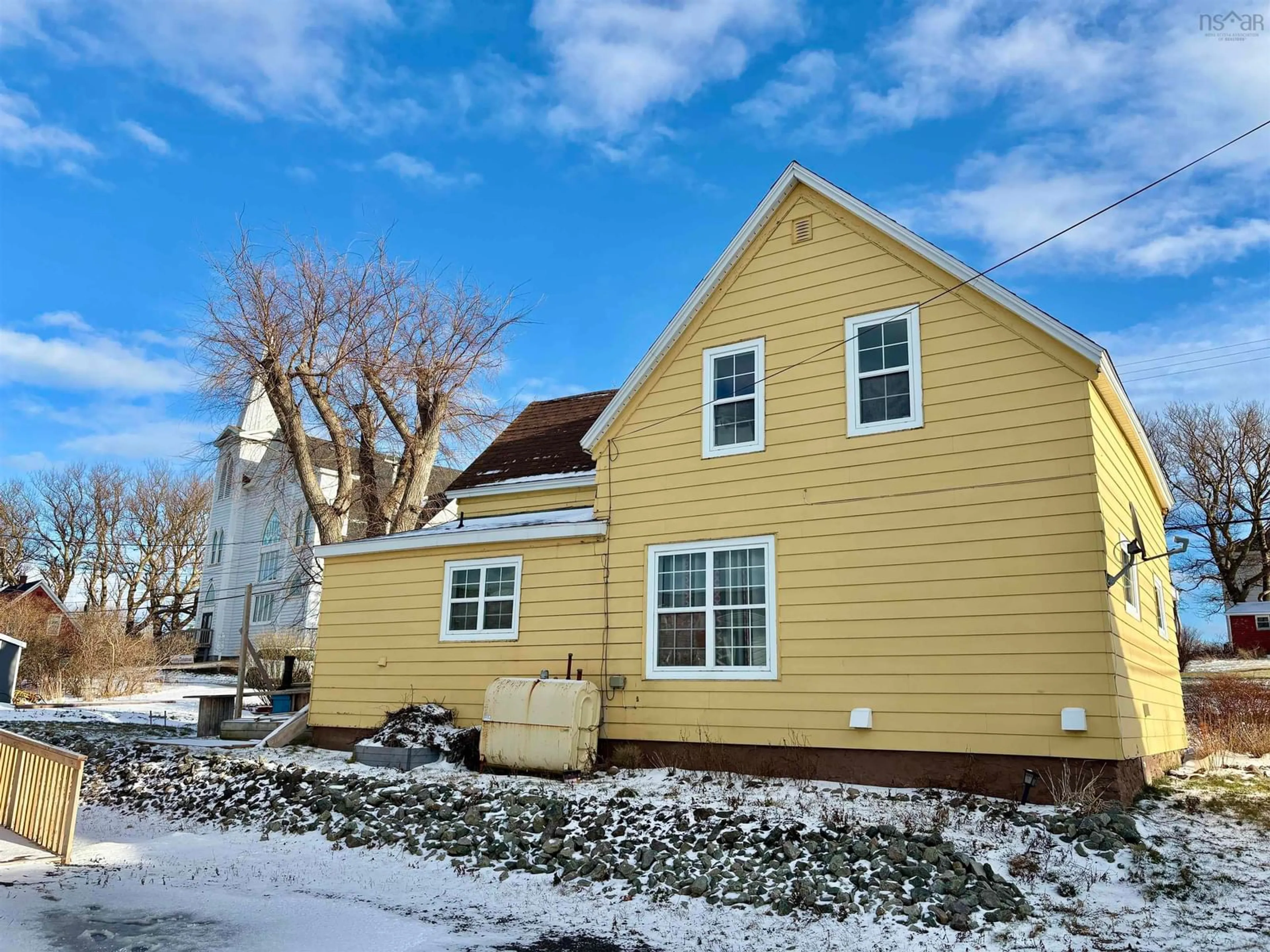 Home with vinyl exterior material, street for 73 Church St., Inverness Nova Scotia B0E 2C0