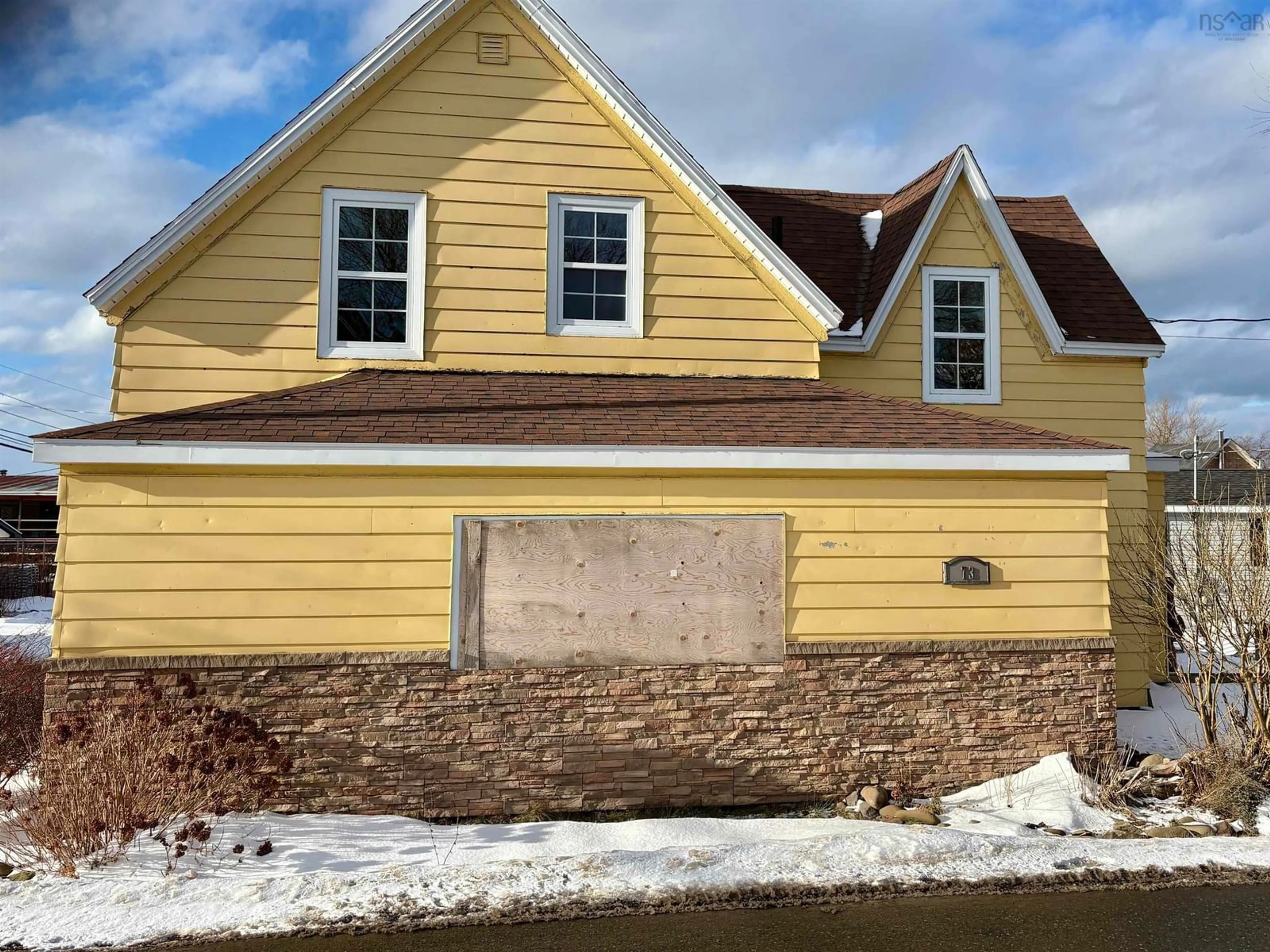 Home with vinyl exterior material, street for 73 Church St., Inverness Nova Scotia B0E 2C0