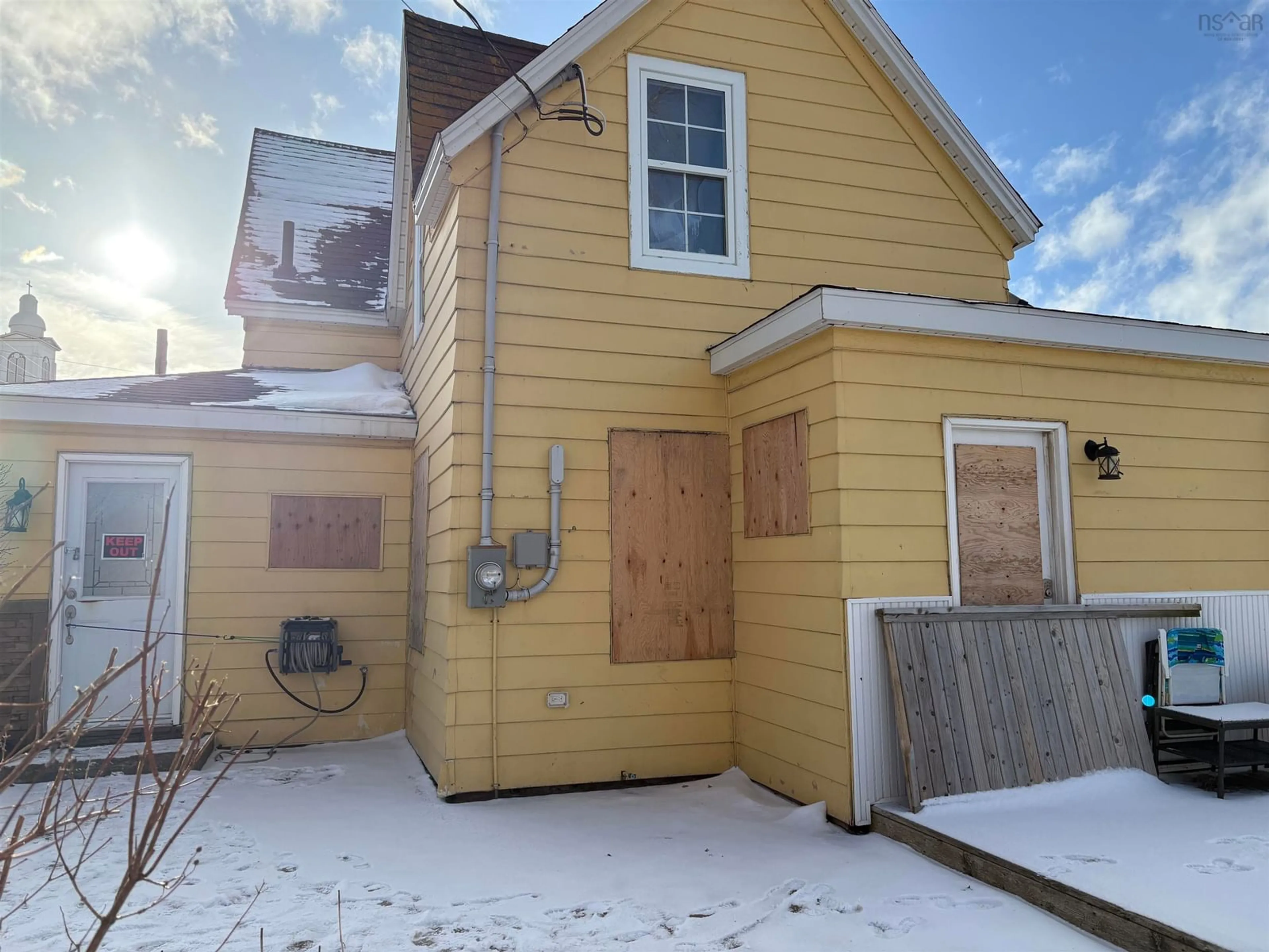 Home with vinyl exterior material, street for 73 Church St., Inverness Nova Scotia B0E 2C0