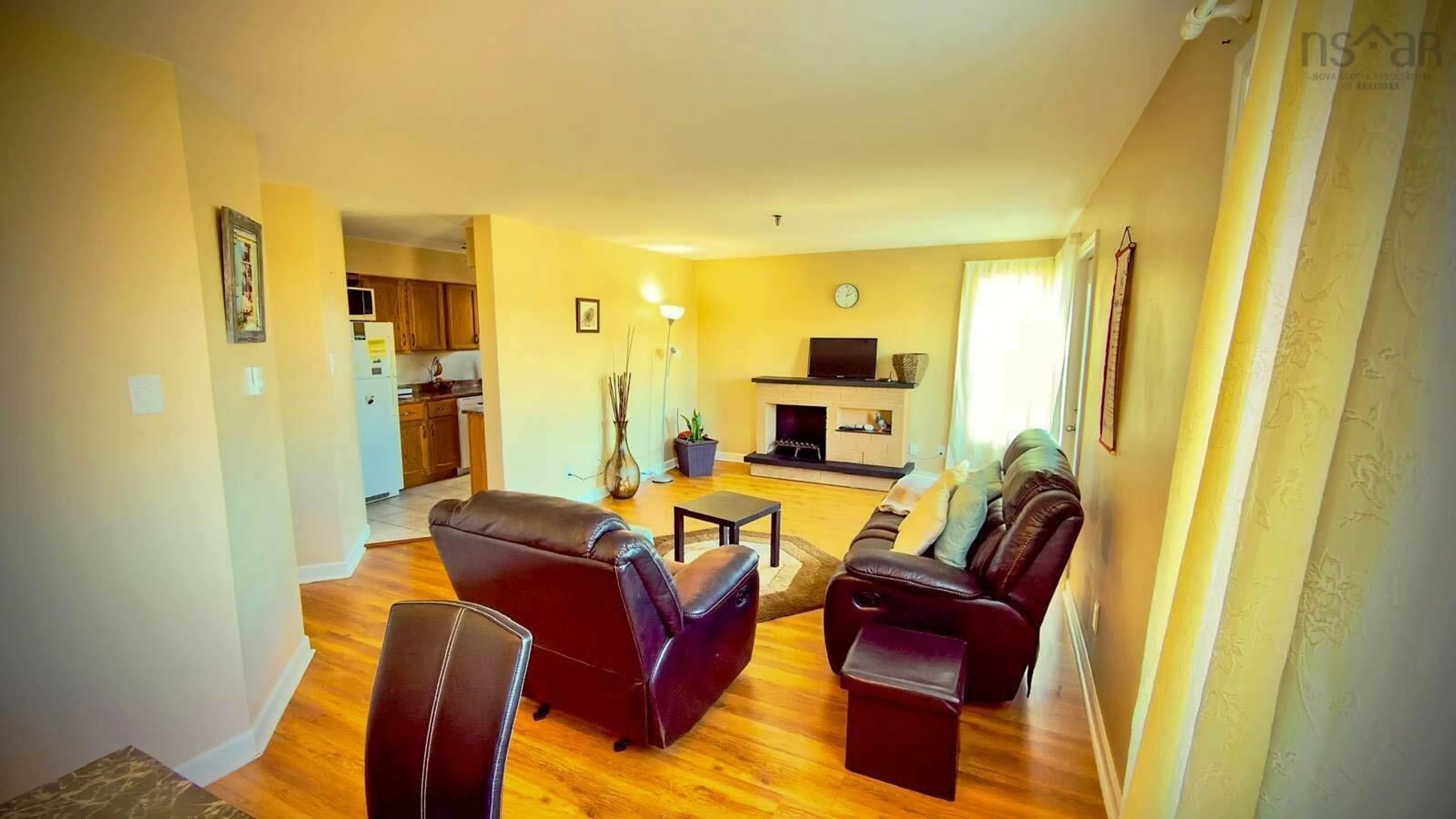 Living room with furniture, wood/laminate floor for 248 Ross St #201, Halifax Nova Scotia B3M 3Z6