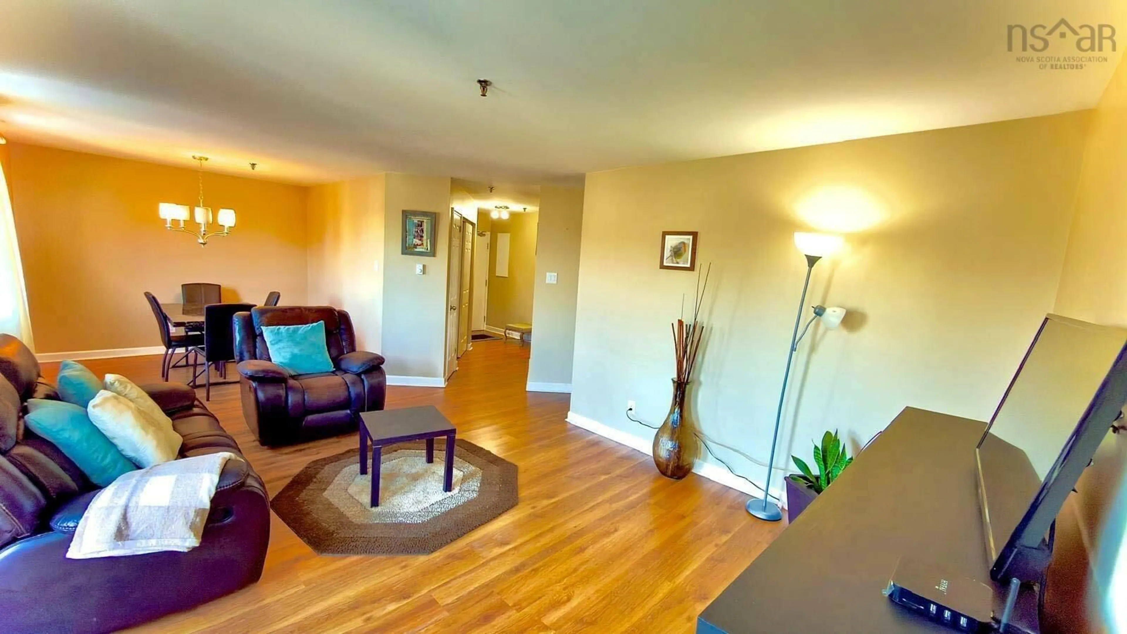 Living room with furniture, wood/laminate floor for 248 Ross St #201, Halifax Nova Scotia B3M 3Z6