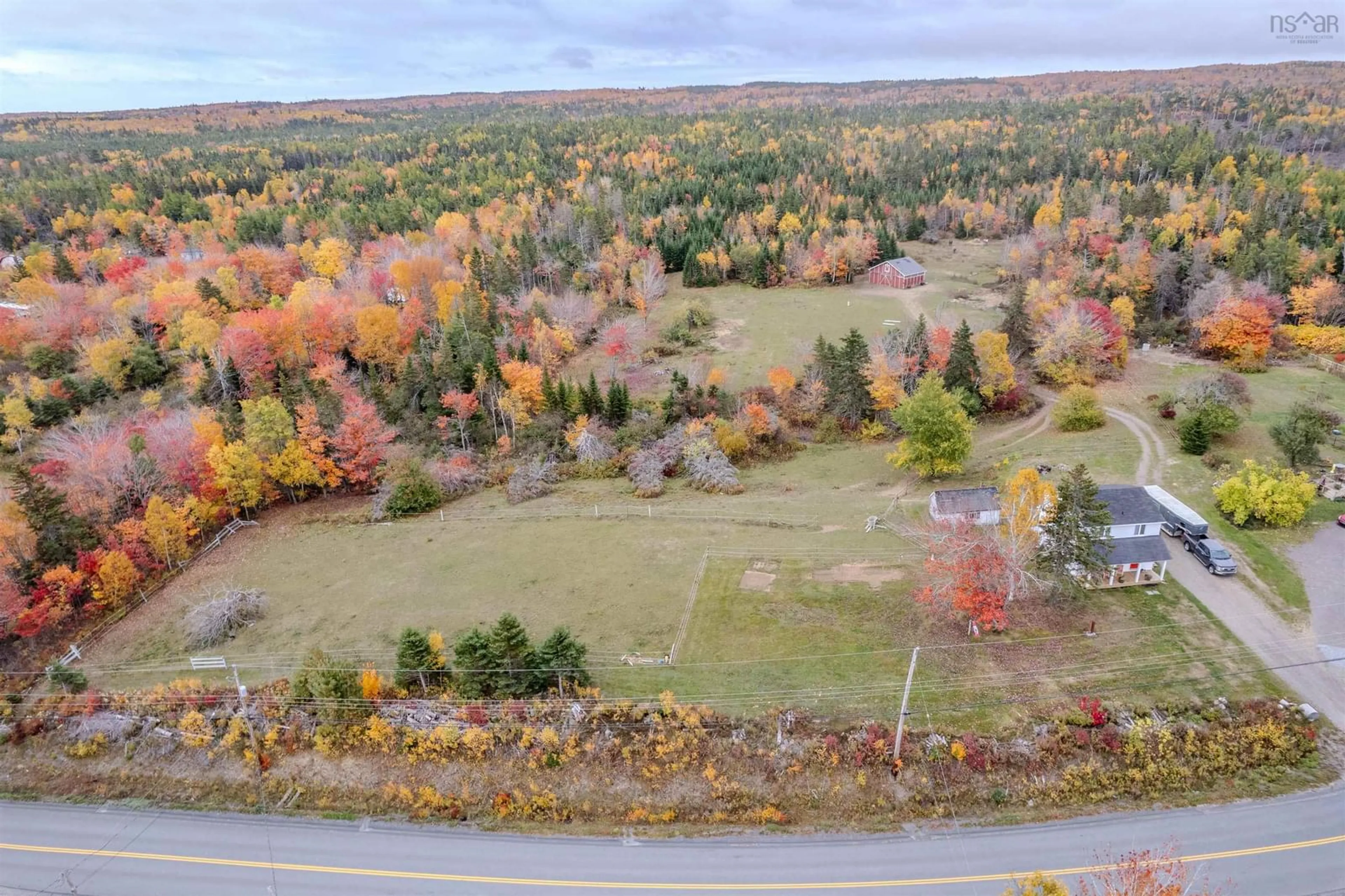 A pic from outside/outdoor area/front of a property/back of a property/a pic from drone, forest/trees view for 328 Brickyard Rd, Cape Breton Nova Scotia B1K 2R7