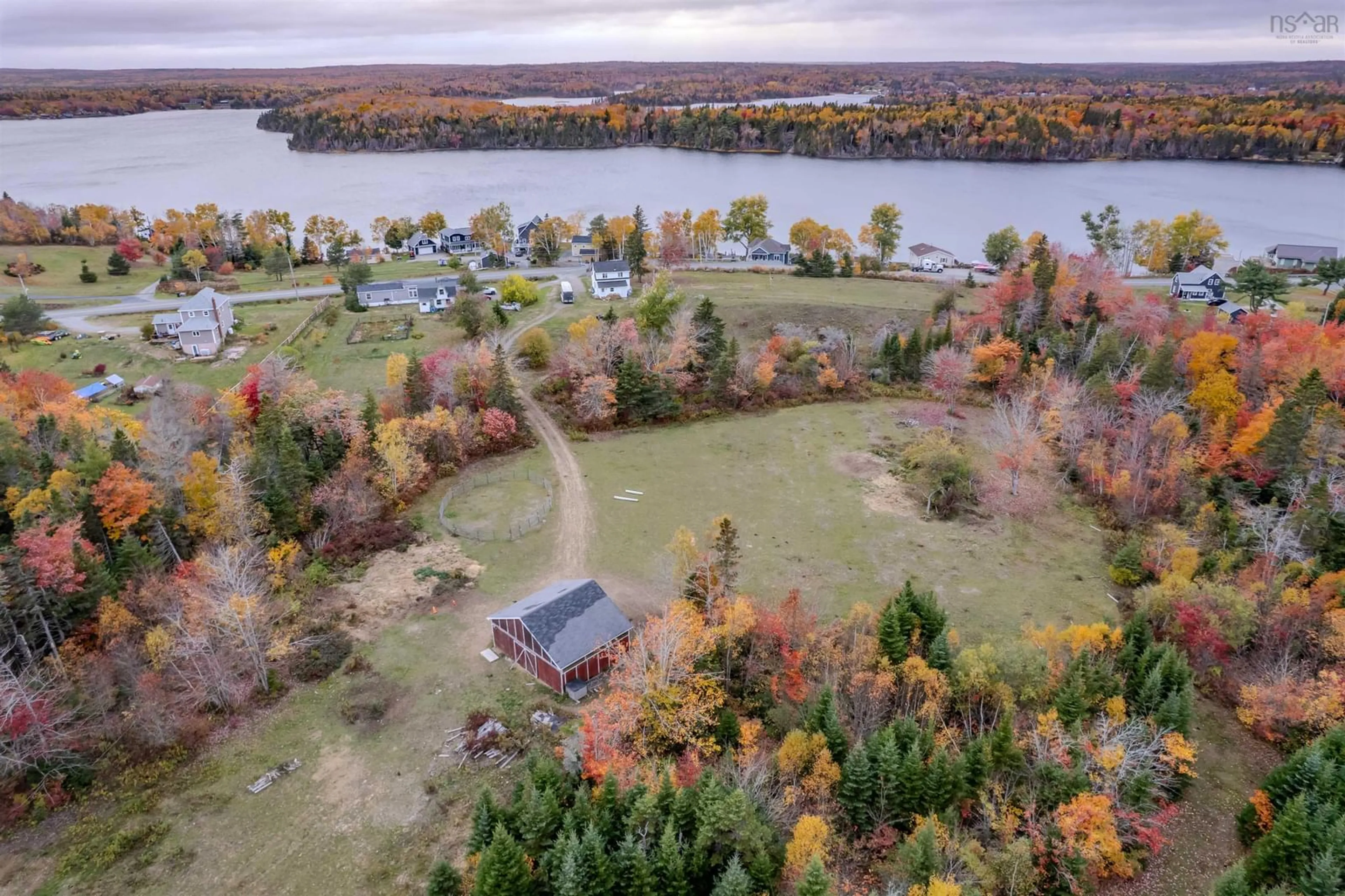 A pic from outside/outdoor area/front of a property/back of a property/a pic from drone, water/lake/river/ocean view for 328 Brickyard Rd, Cape Breton Nova Scotia B1K 2R7