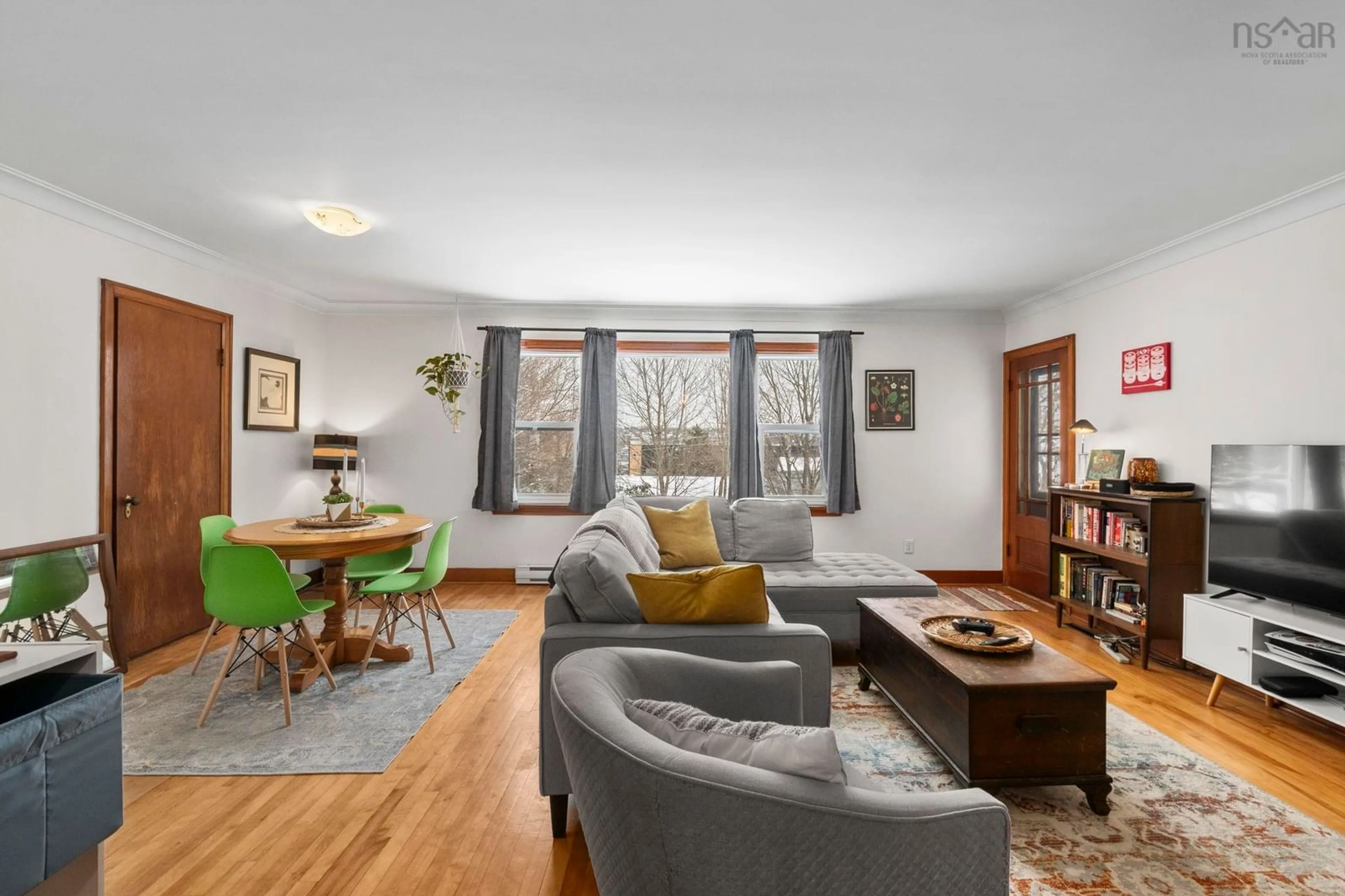 Living room with furniture, wood/laminate floor for 27 Chittick Ave, Dartmouth Nova Scotia B2Y 3J7