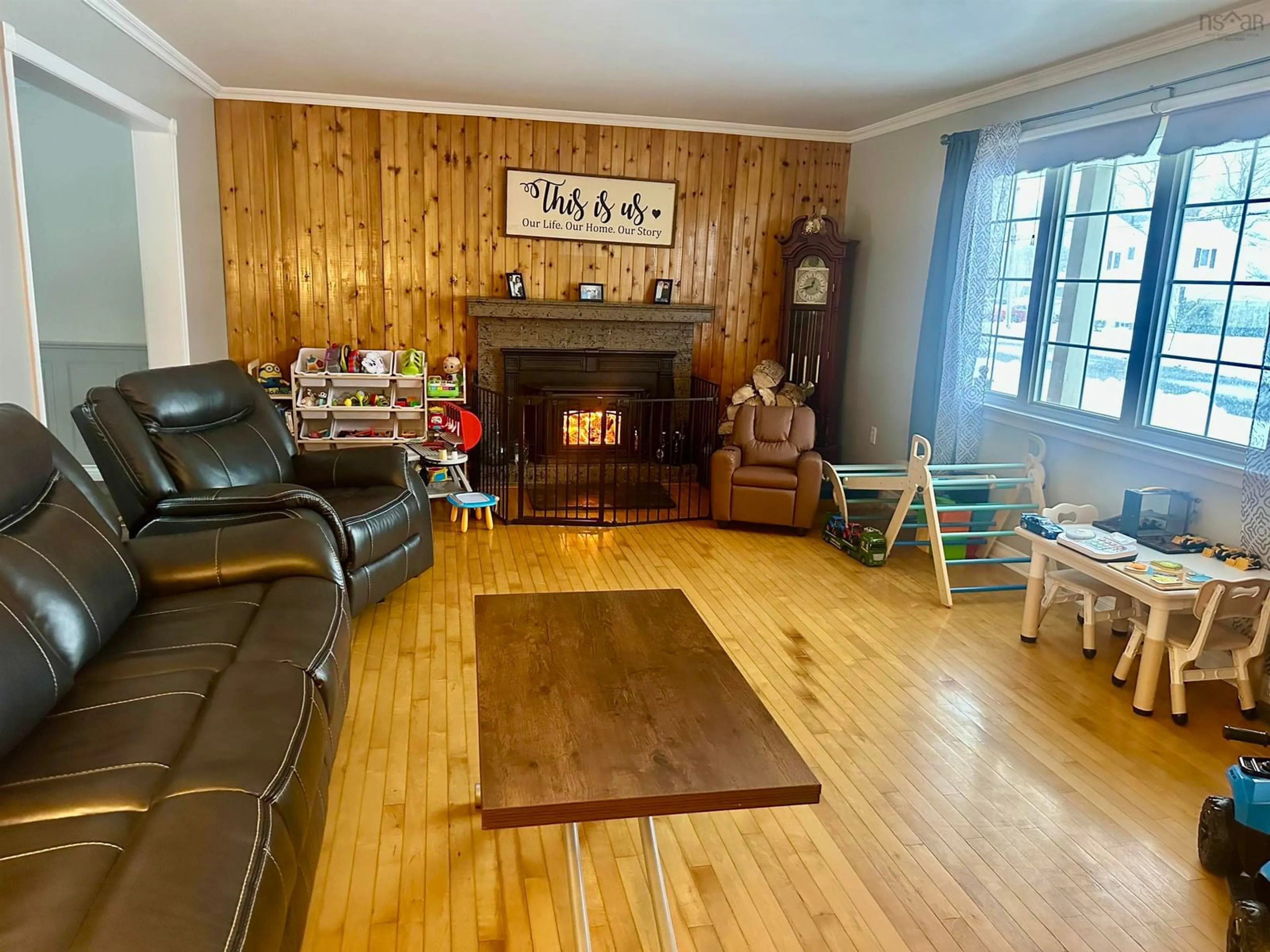 Living room with furniture, wood/laminate floor for 42 Napean St, Port Hawkesbury Nova Scotia B9A 1P2